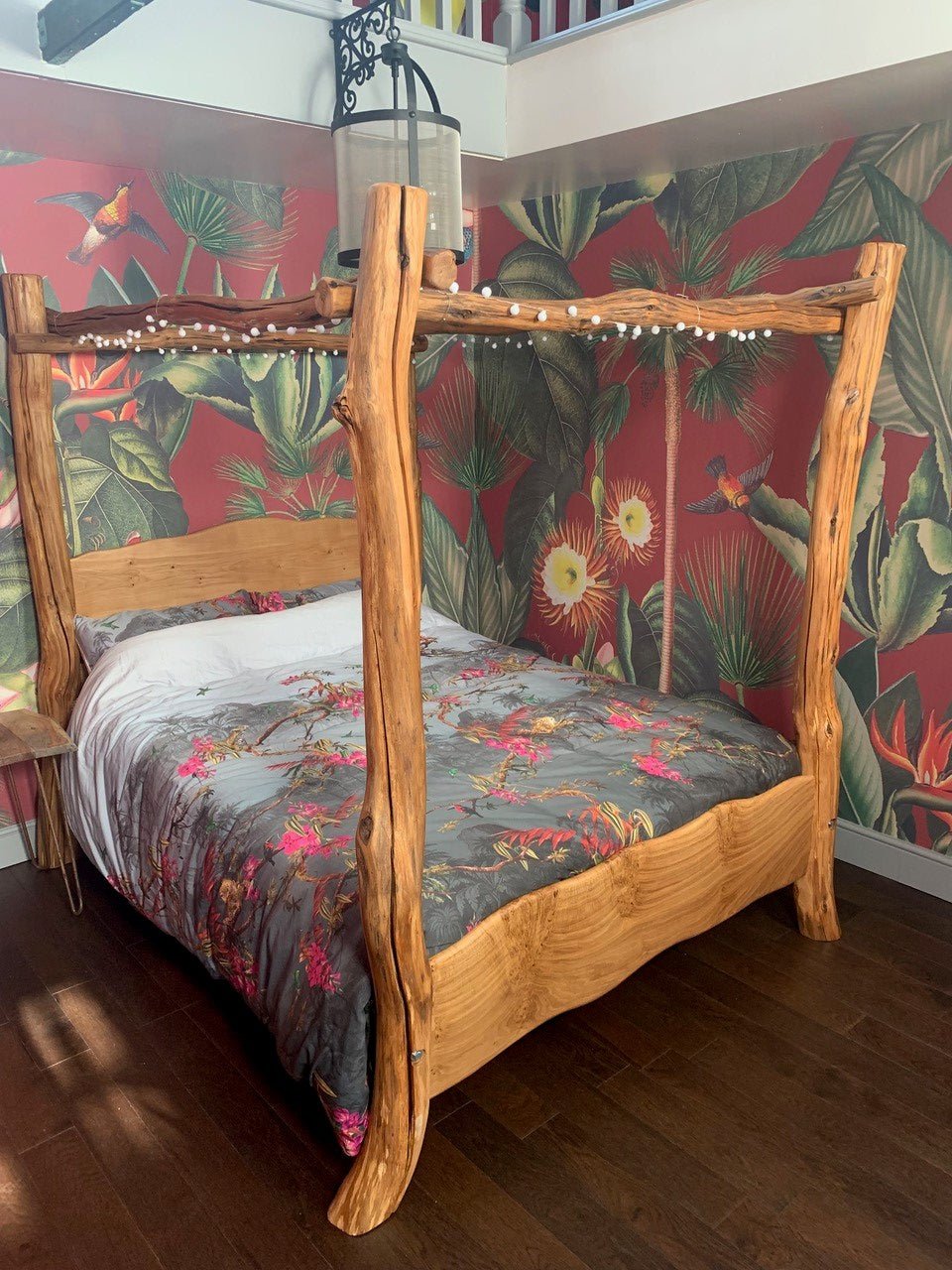 Rustic four poster oak bed in situ