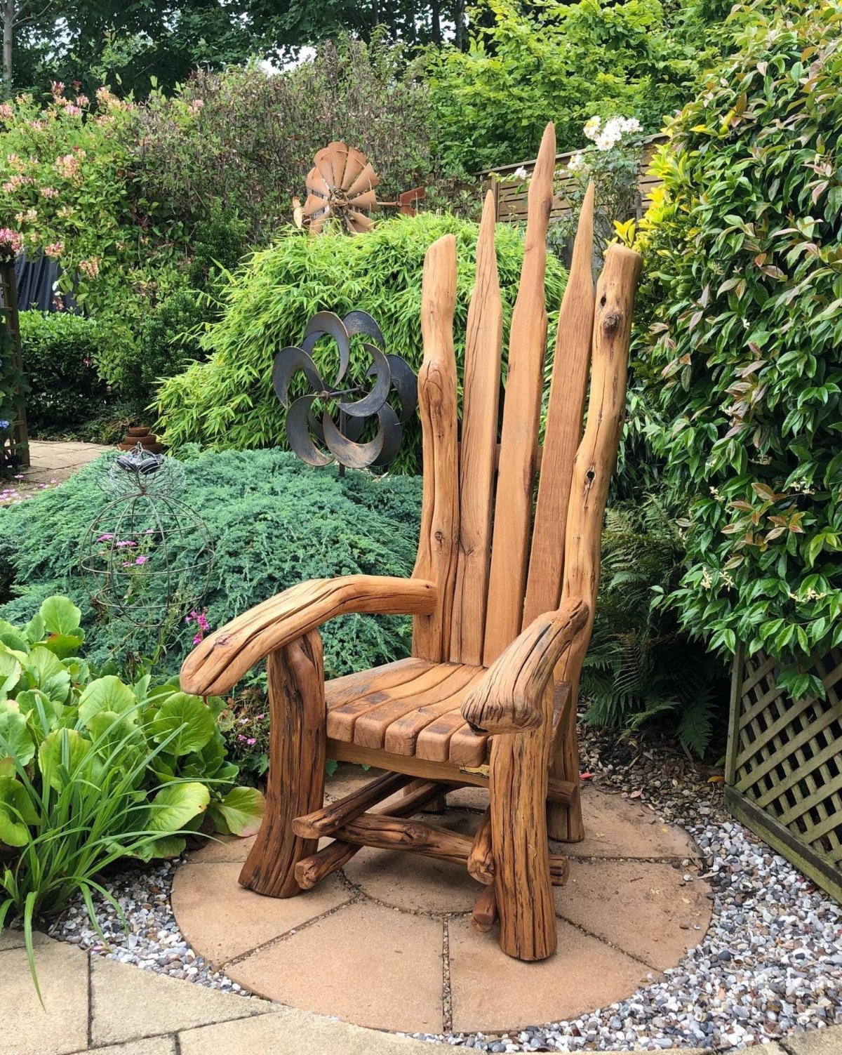 Unique Giant wooden throne made from oak in garden