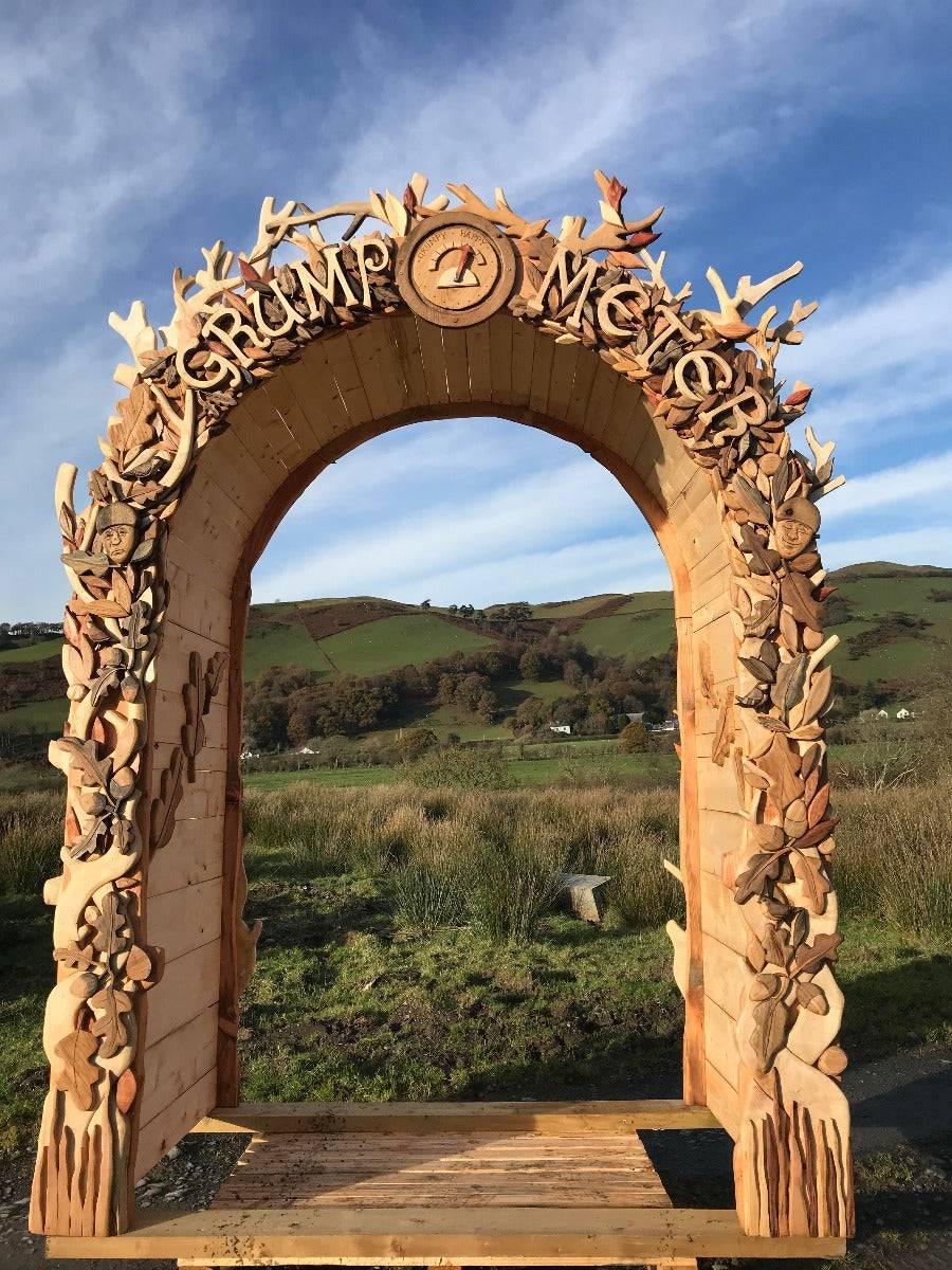 hand-carved wooden arch