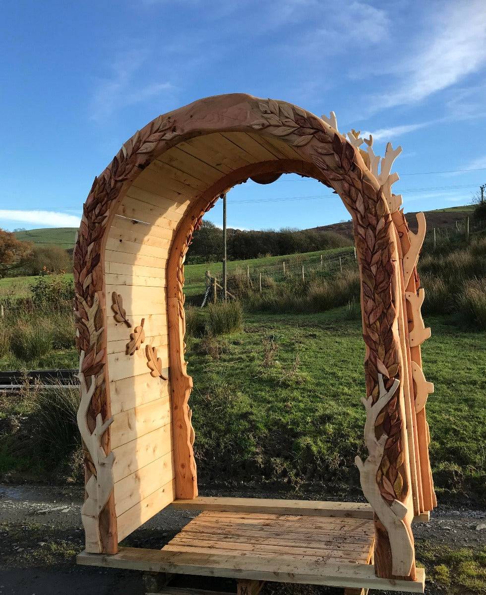hand-carved wooden arch