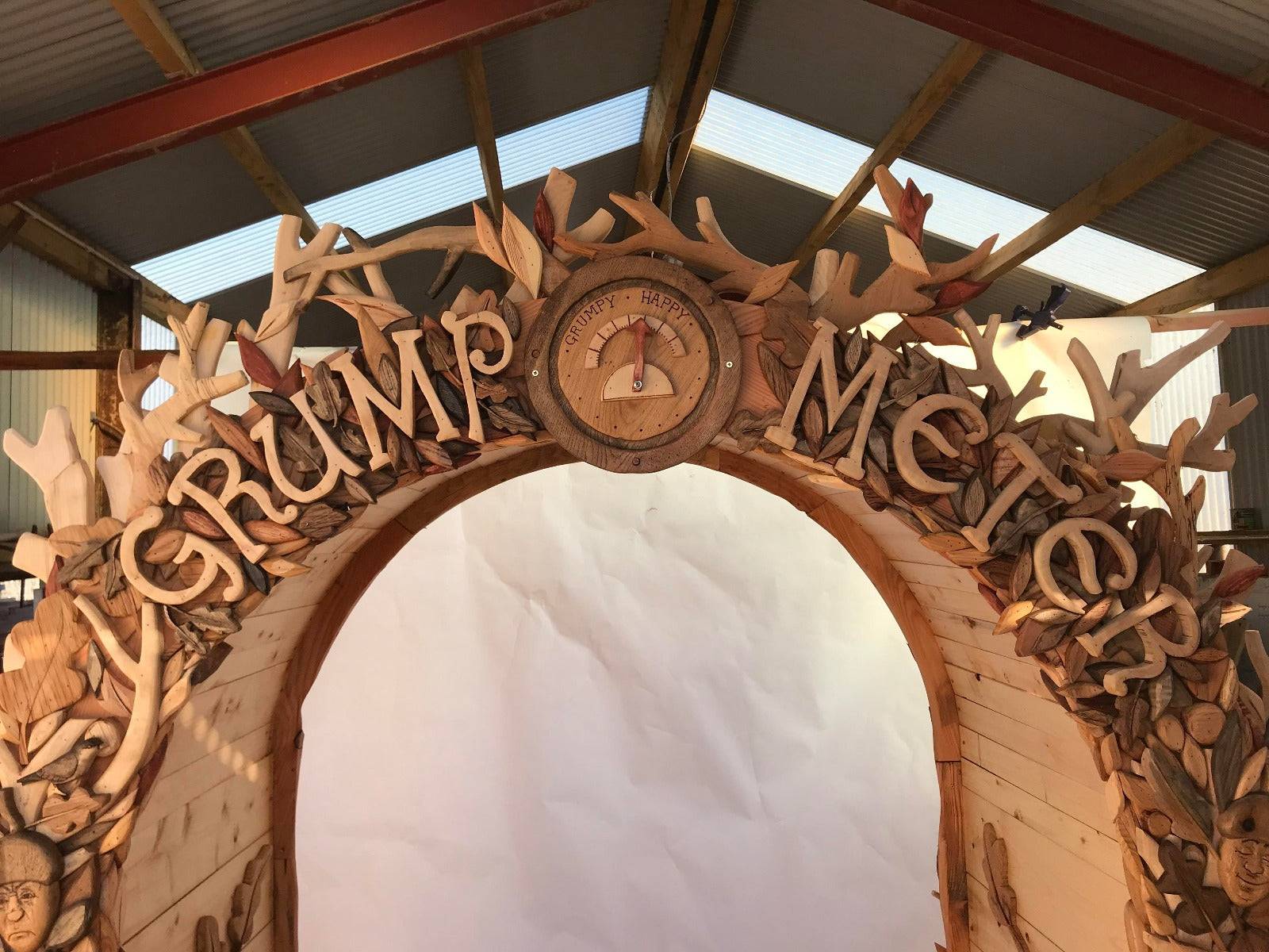 carved wood arch