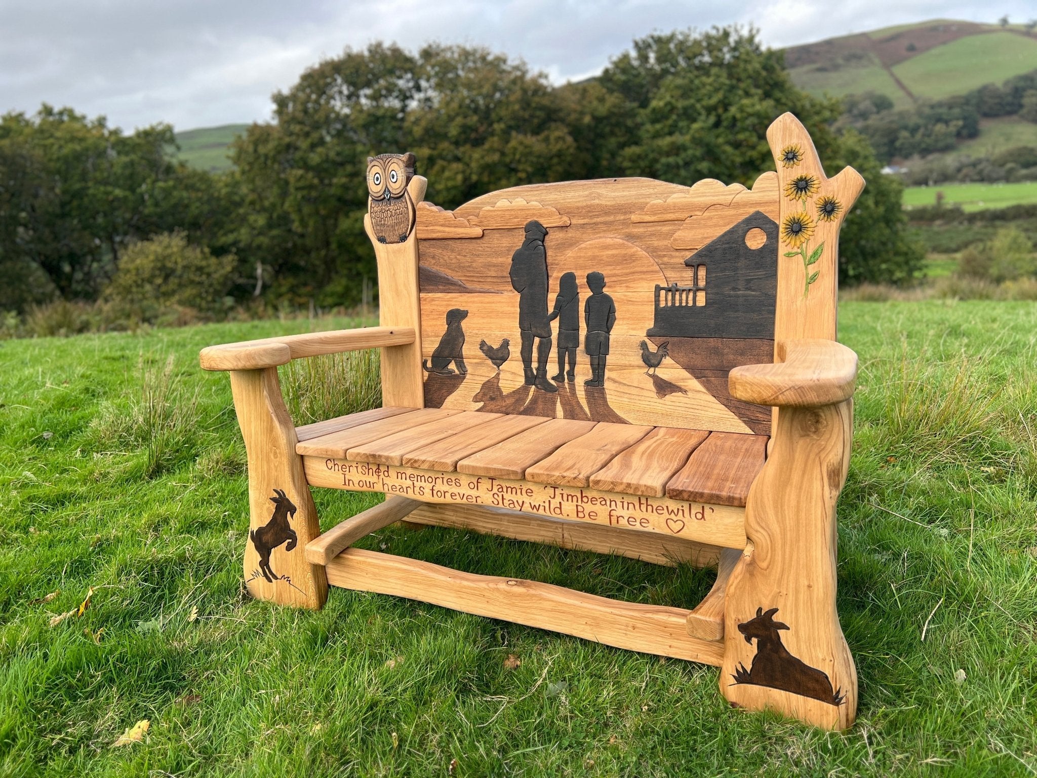 personalised wooden memorial bench for garden with owl and flower motifs