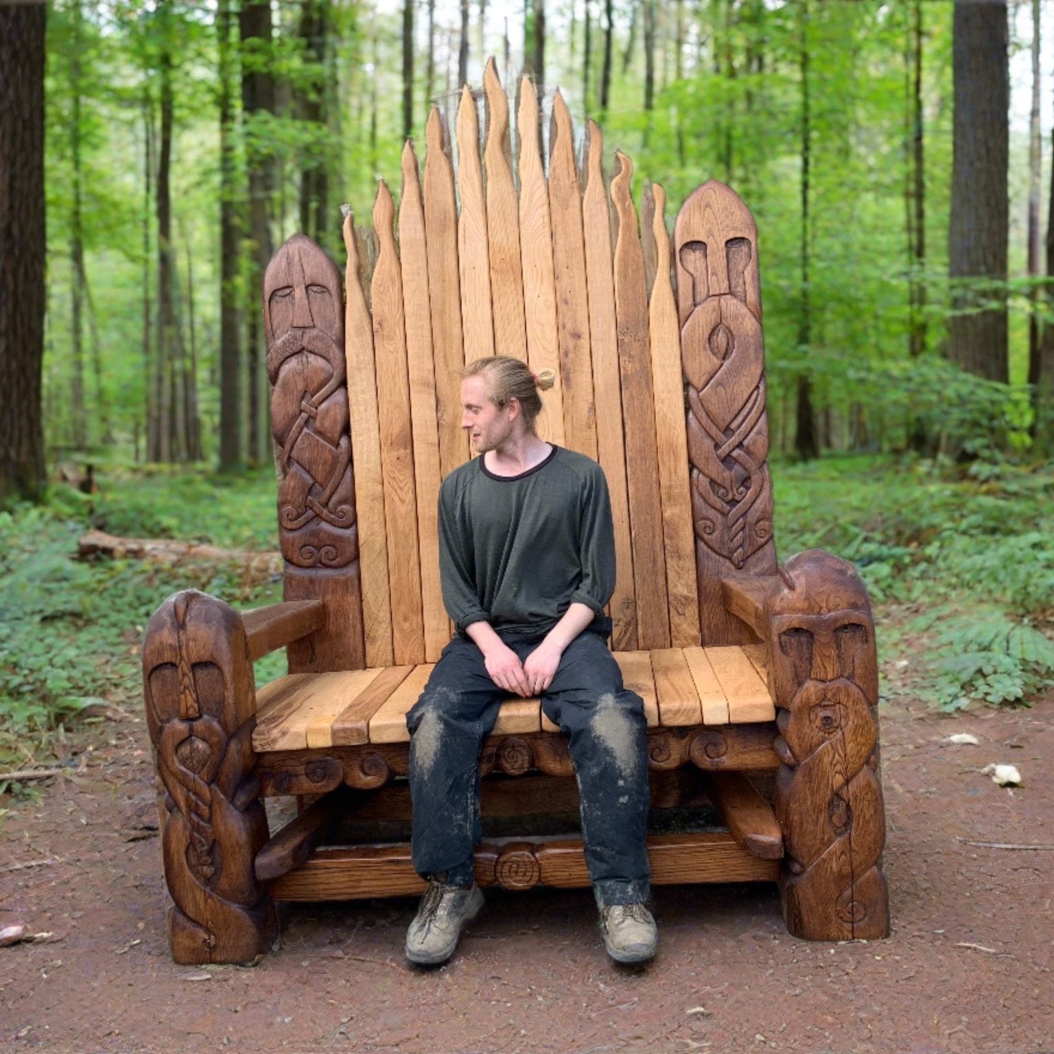 Viking-style wooden throne in forest setting