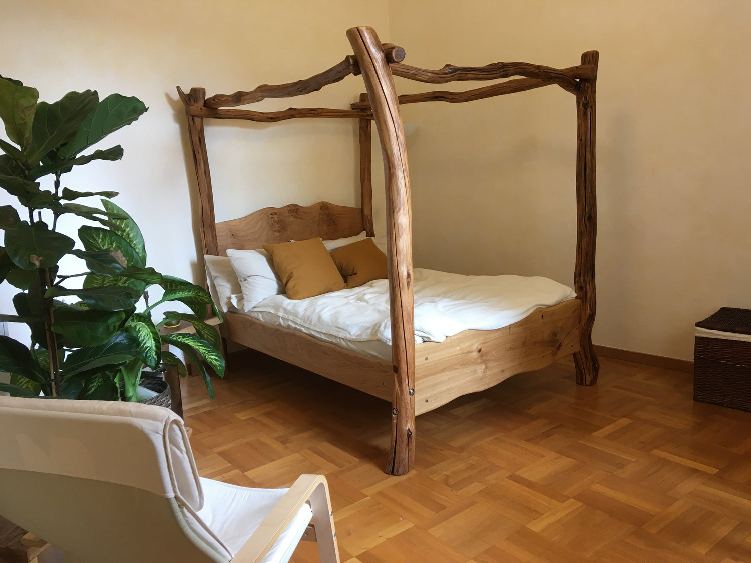 Natural handmade wooden four poster bed