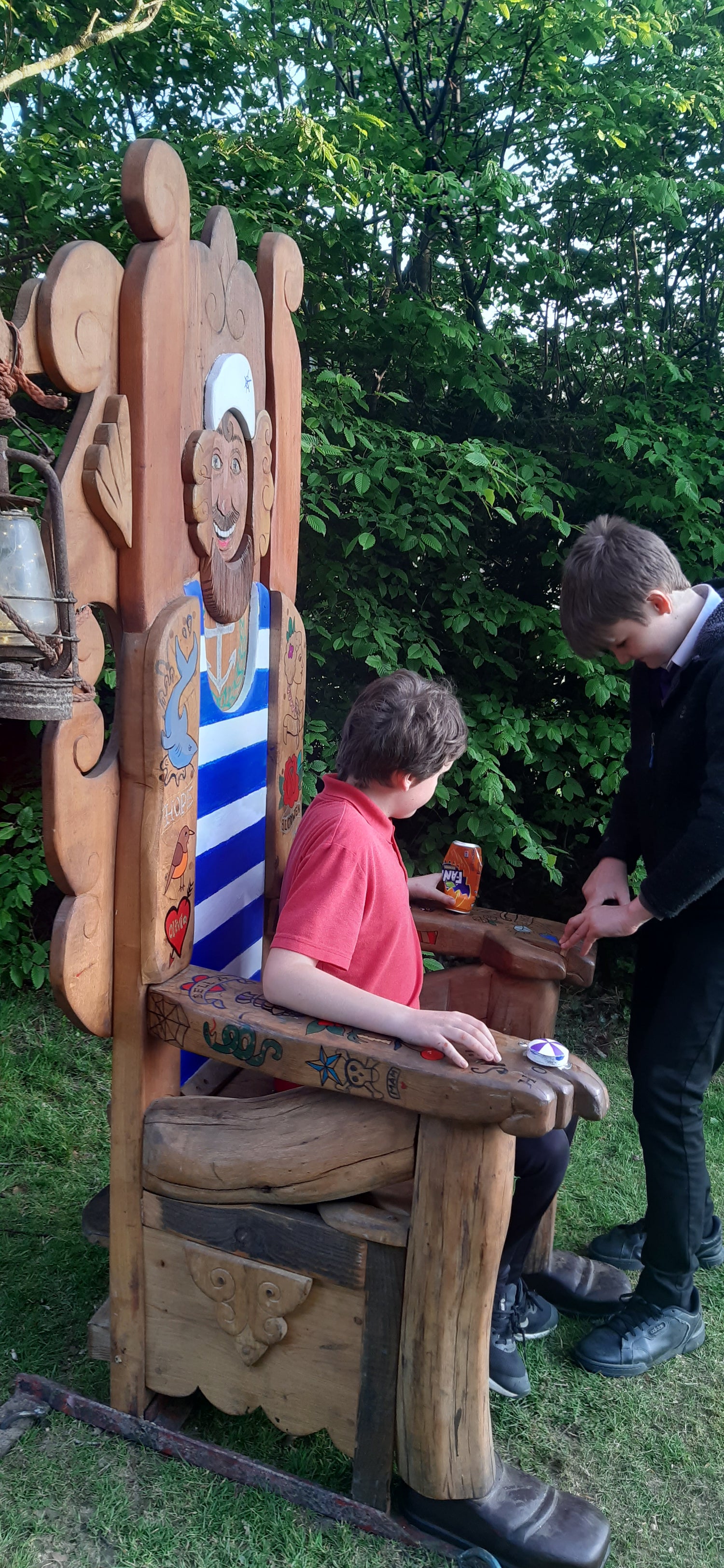 Children interacting with the speaking chair