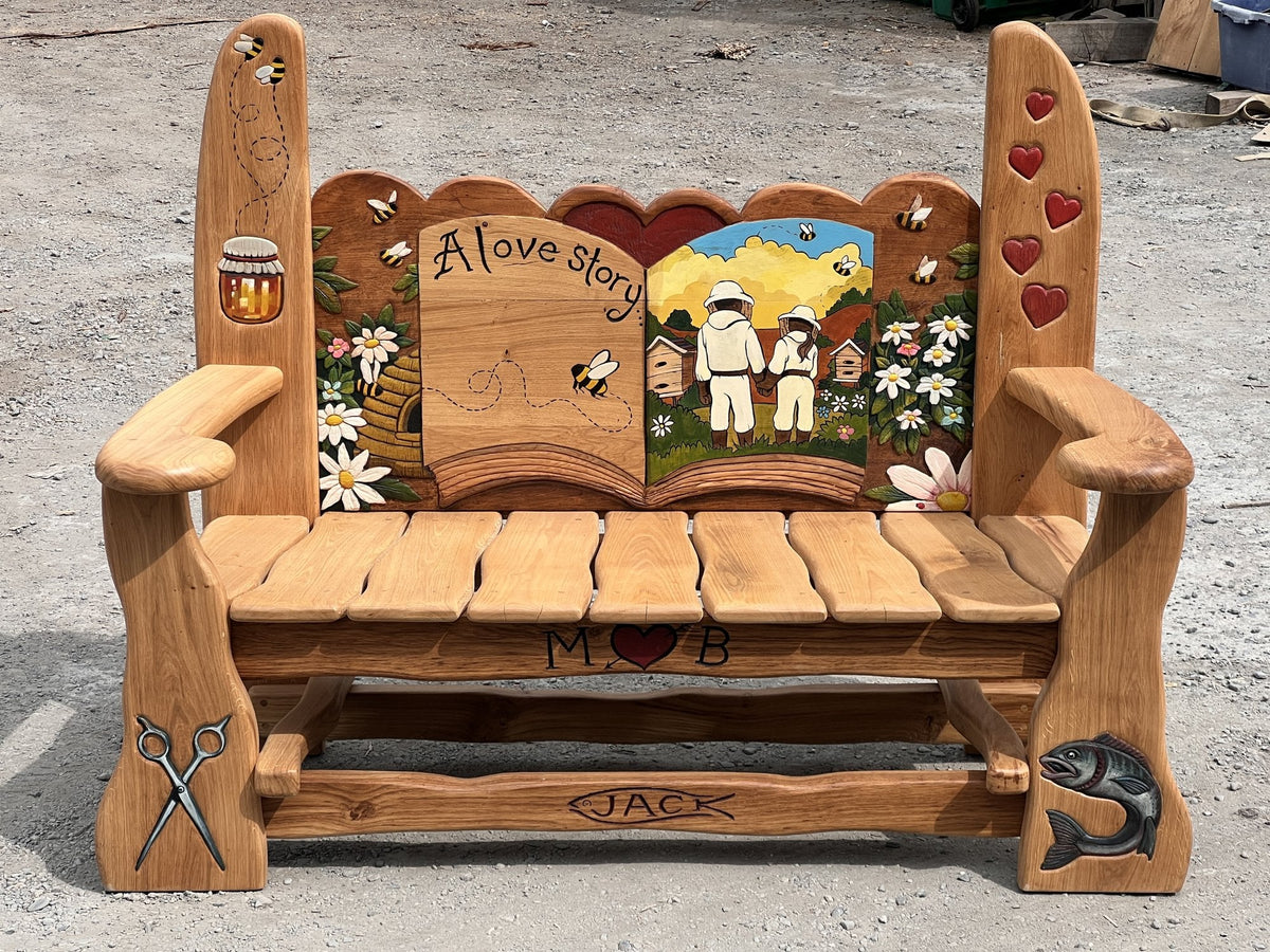 Hand-carved oak anniversary bench with painted beekeepers, honey jar, bees and hearts — Free Range Designs, Mid Wales