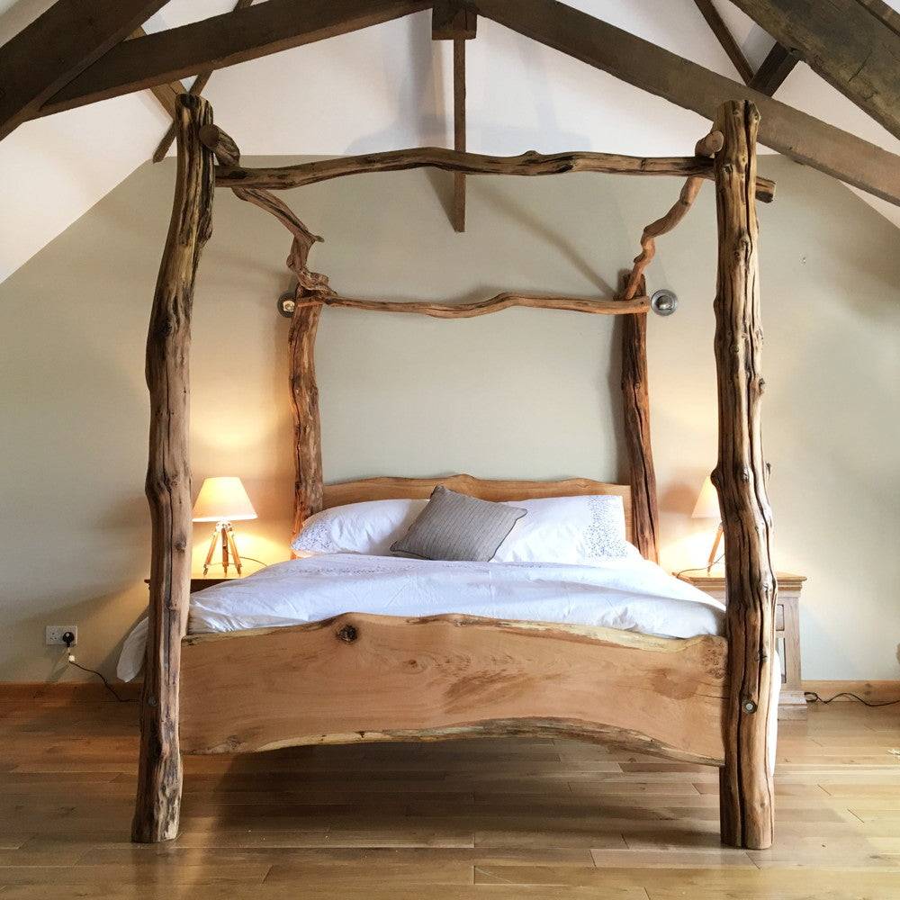 Handmade rustic oak four poster tree bed with branching posts — wooden bed design, Mid Wales