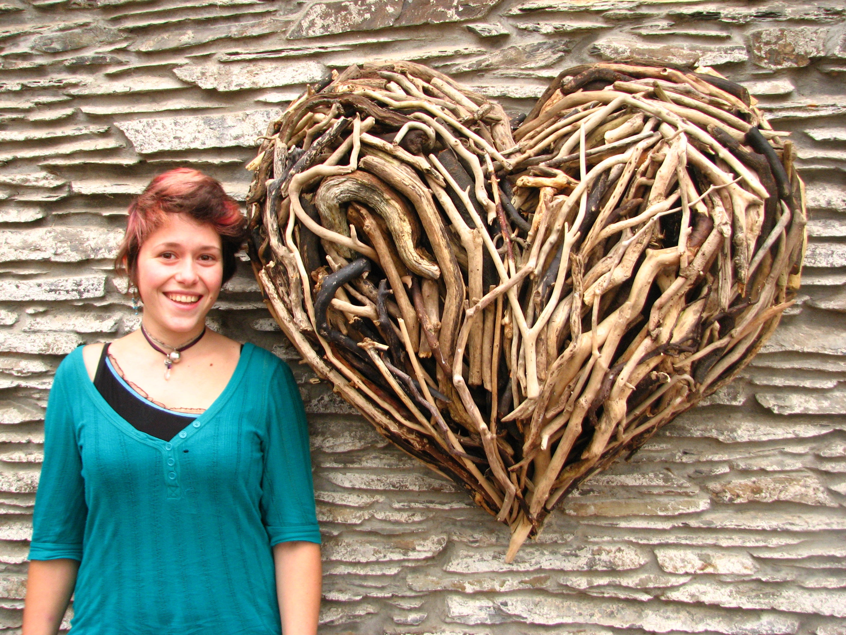 driftwood heart on a wall 