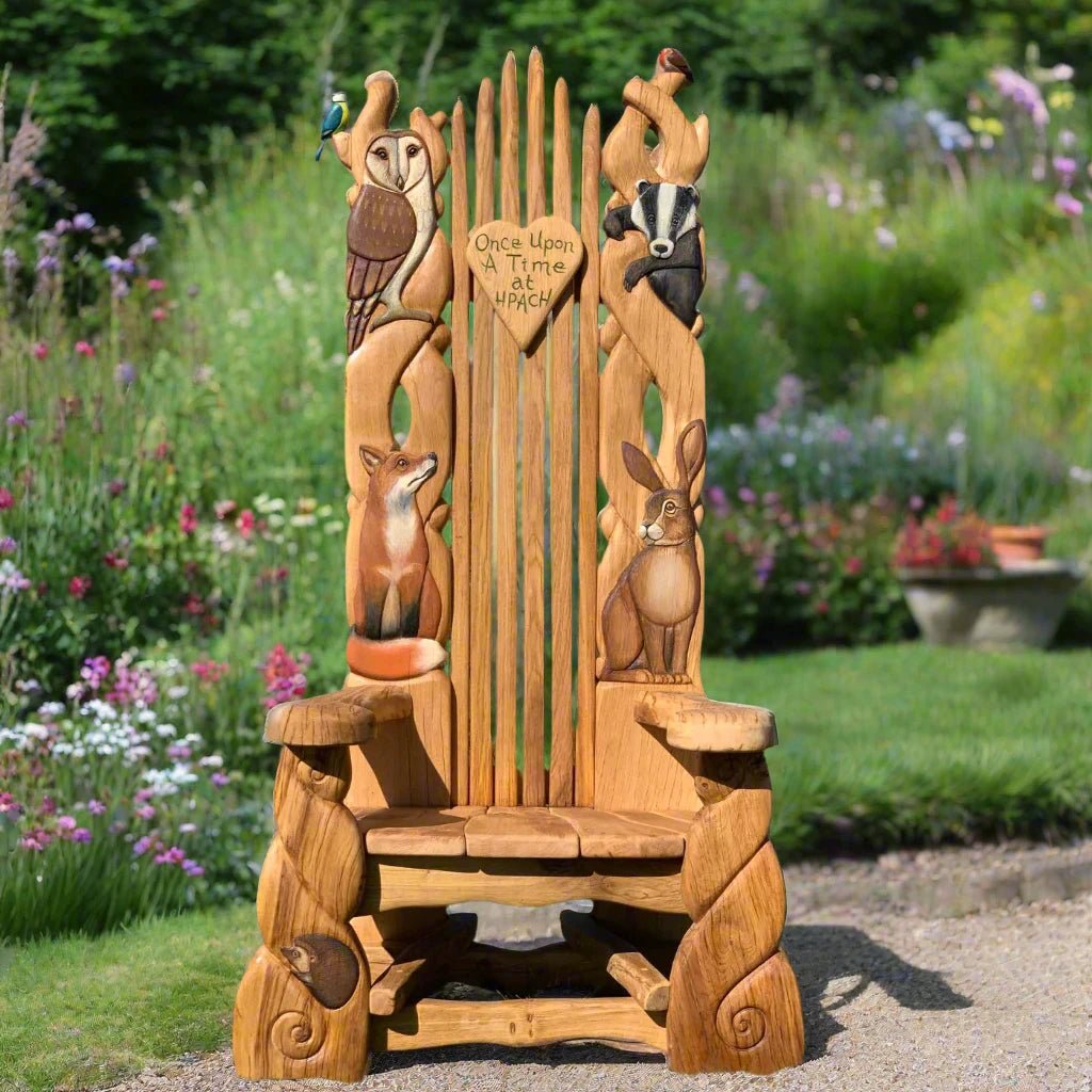 Handcrafted storytelling chair featuring intricately carved woodland animals, perfect for inspiring imagination in gardens, schools, and outdoor spaces.