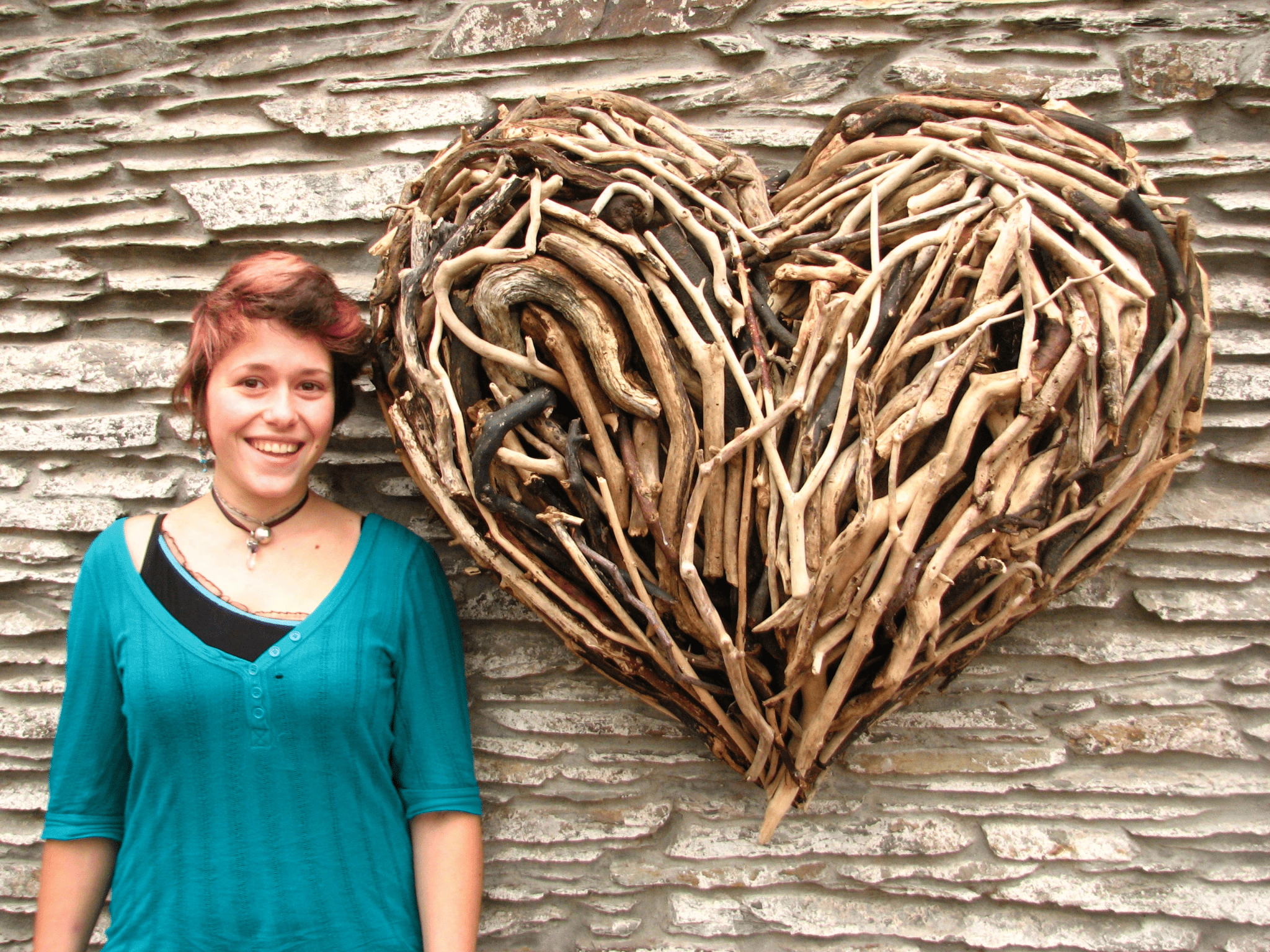 driftwood heart on a wall 