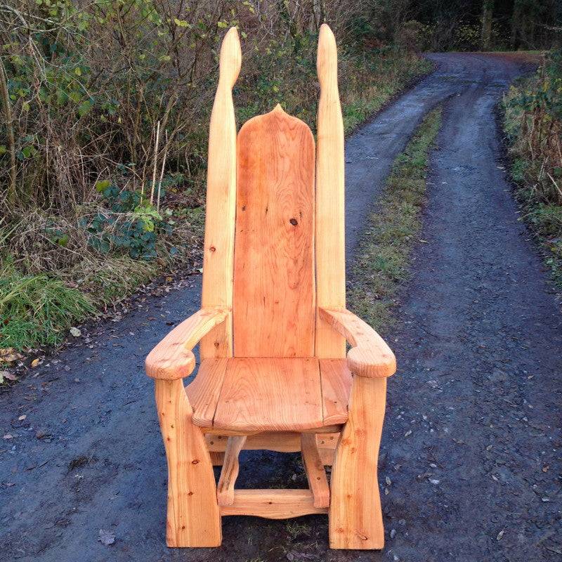 Carved oak pixie woodland storytelling chair for schools — handmade in Wales