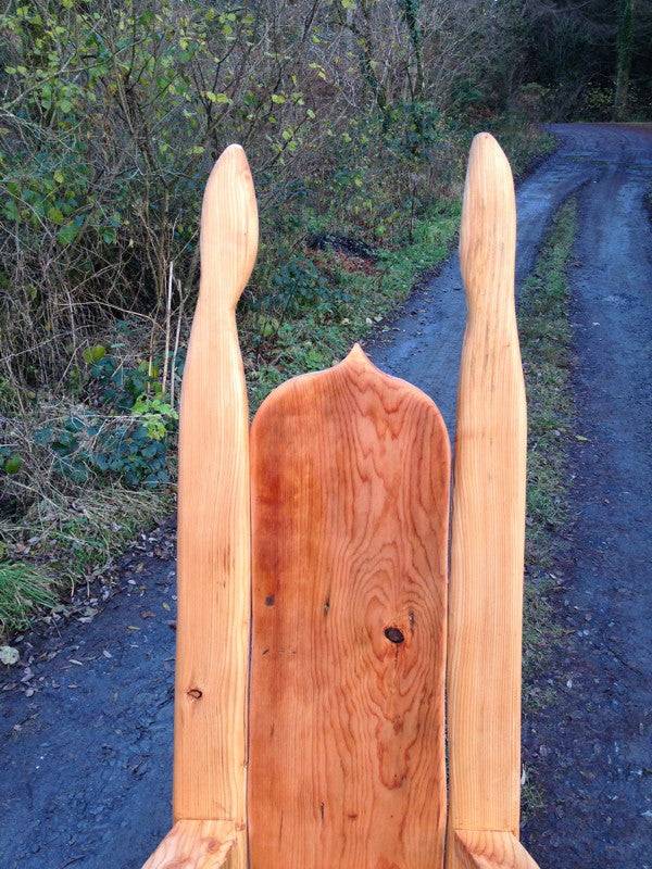 Carved back of handmade oak pixie woodland storytelling chair — bespoke school reading throne, Wales