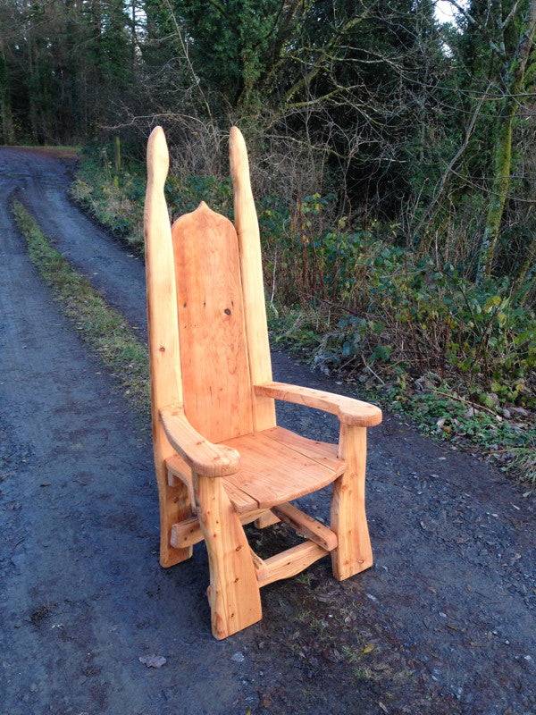 Oak storytelling chair for school playground — handcrafted pixie woodland design, Wales
