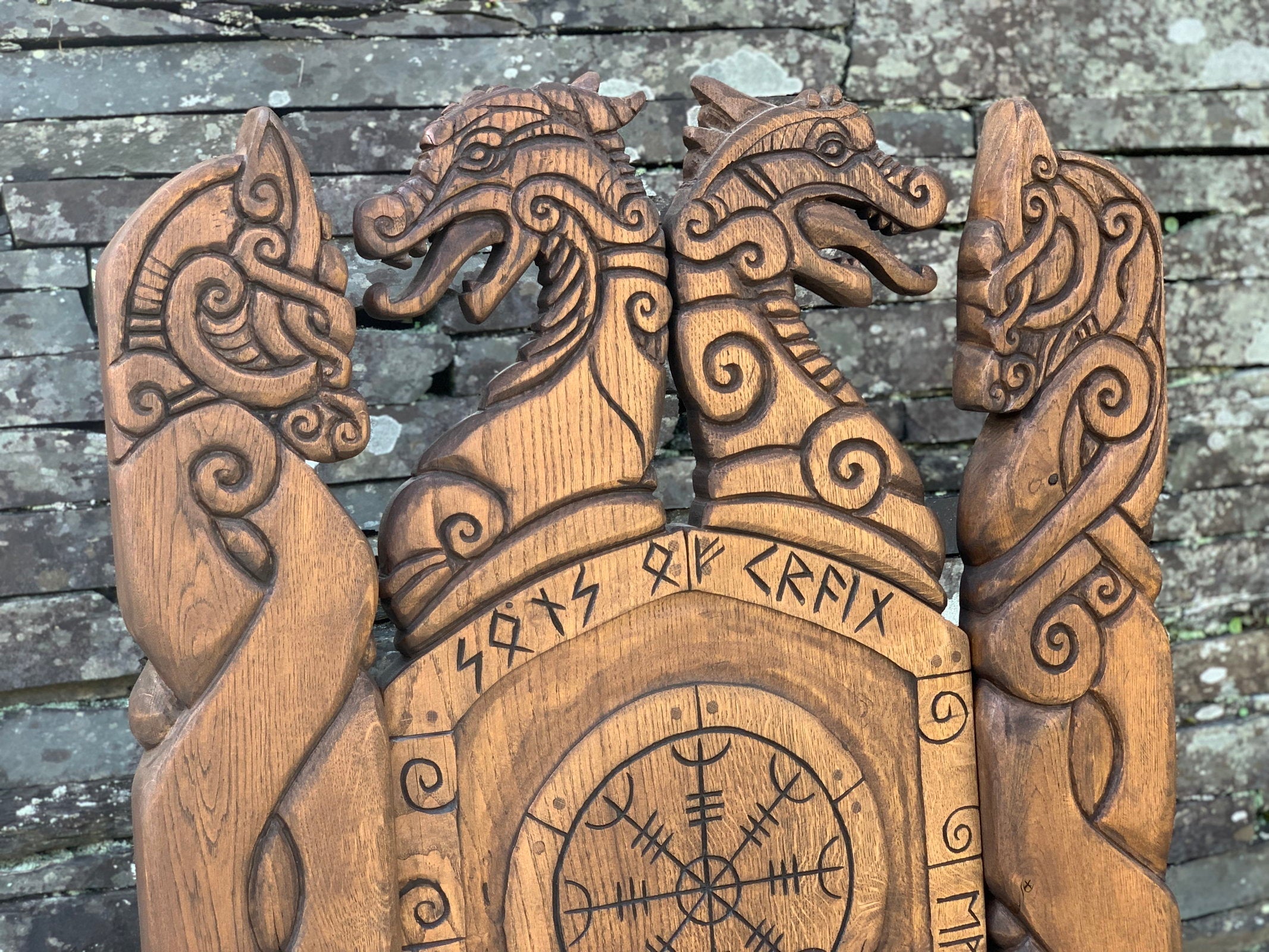 Detailed dragon carvings on Viking chair