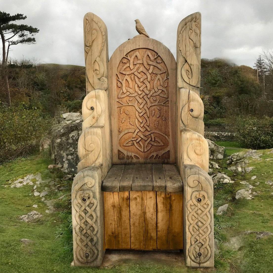 Hand-carved Celtic Viking Chair with intricate knotwork, crafted from solid oak, ideal for storytelling and decorative use