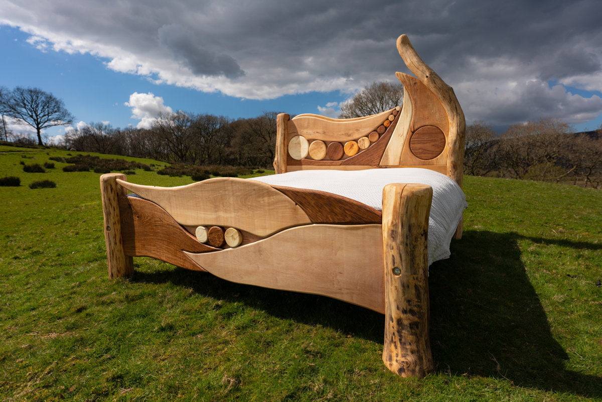 Handcrafted driftwood bed in open landscape