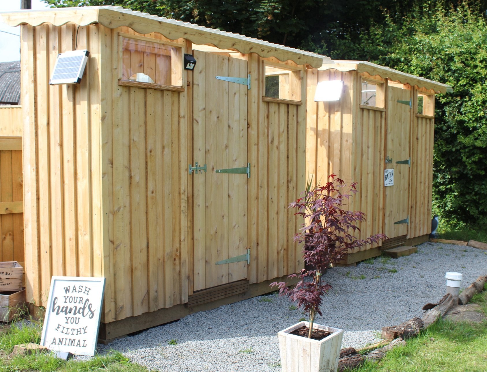 Toilet and shower units for a glamping business in the UK. Wooden units with cedar cladding