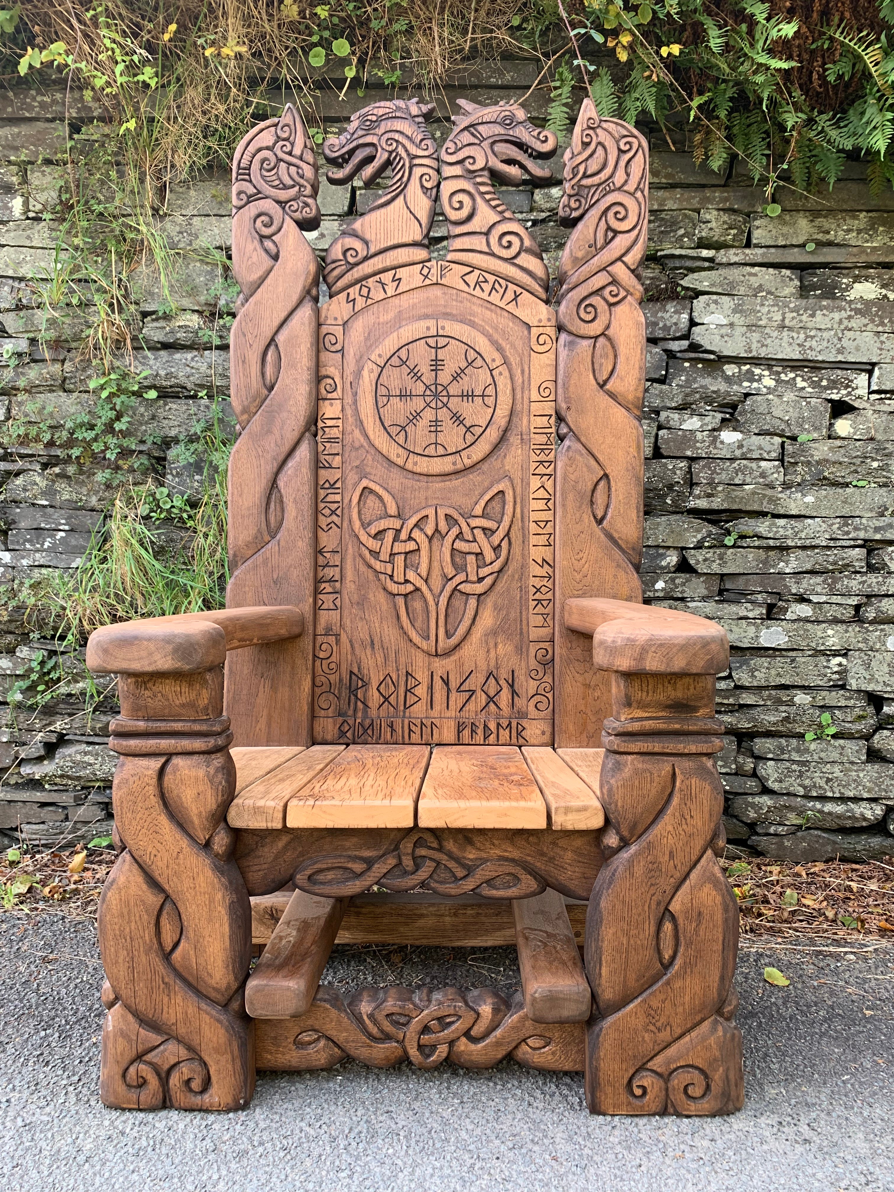 Viking throne with Nordic carvings and symbols