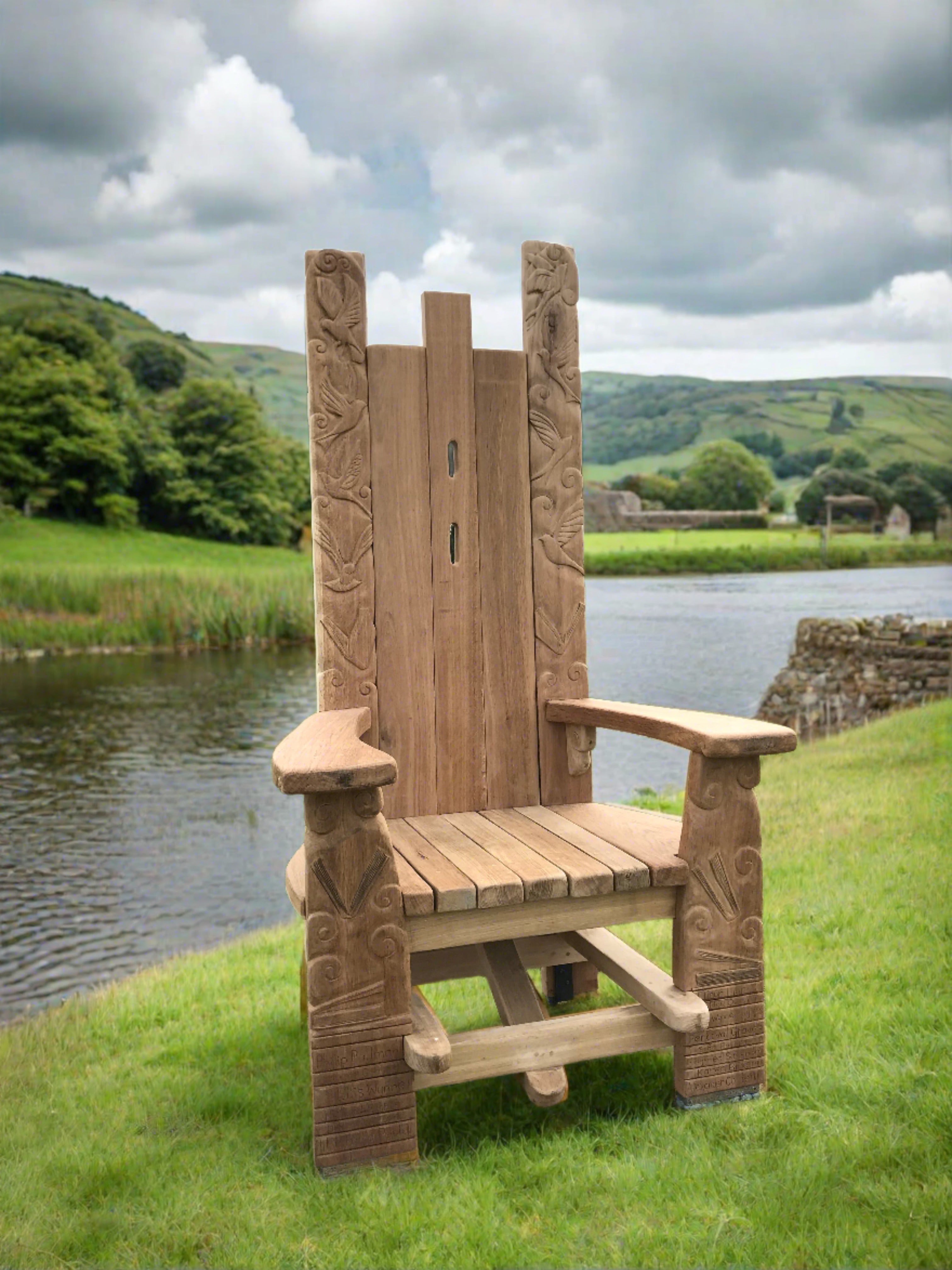 Wooden chair with branch design in landscape