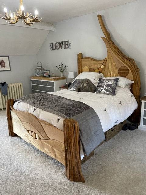 Rustic bespoke bed with unique wood carvings