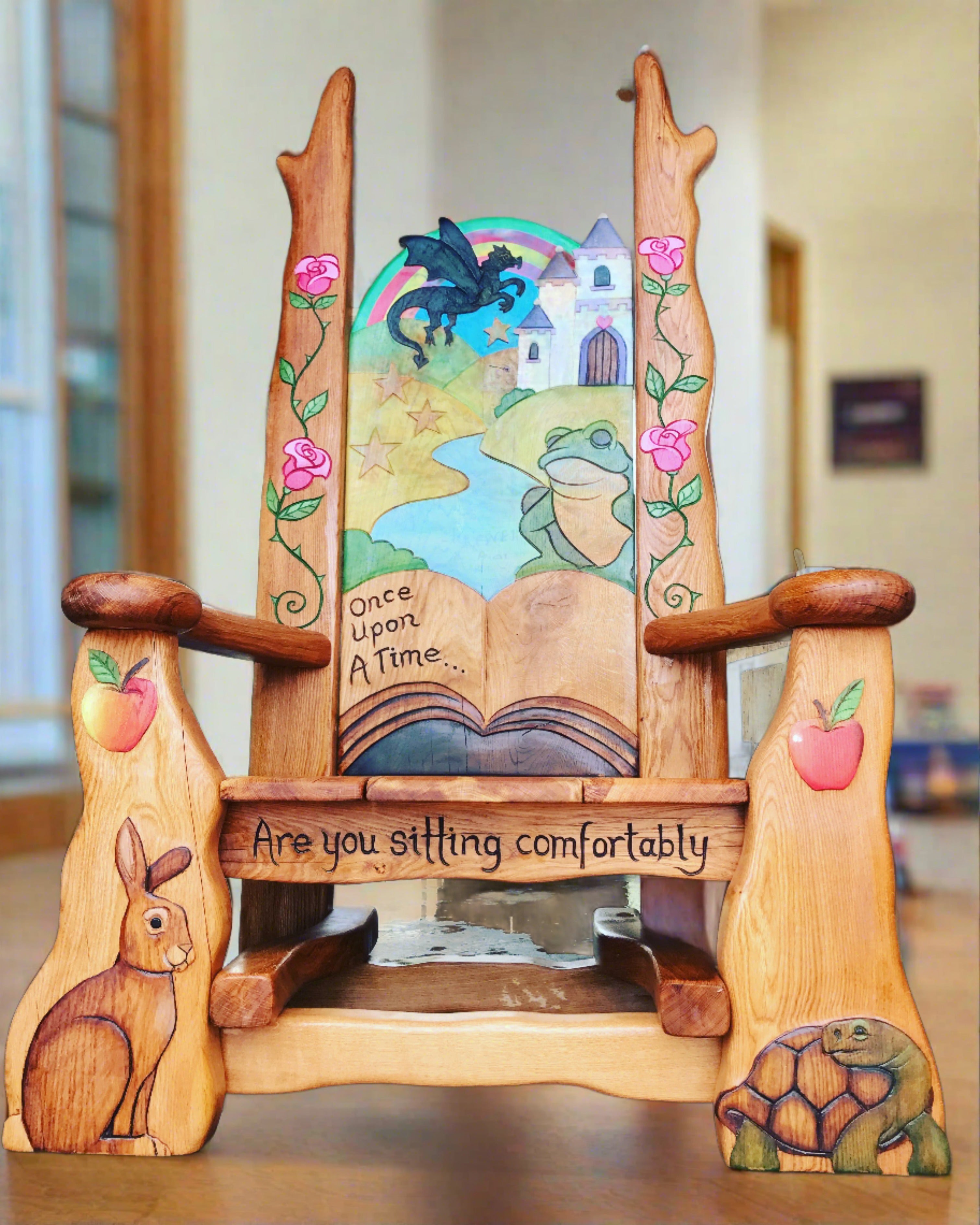 Fairytale-themed wooden chair with animal carvings