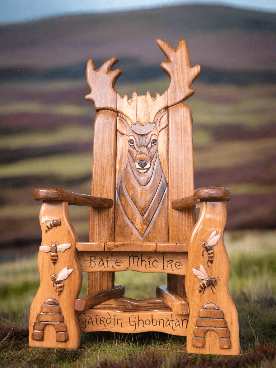 Stag Storytelling Chair with bee carvings