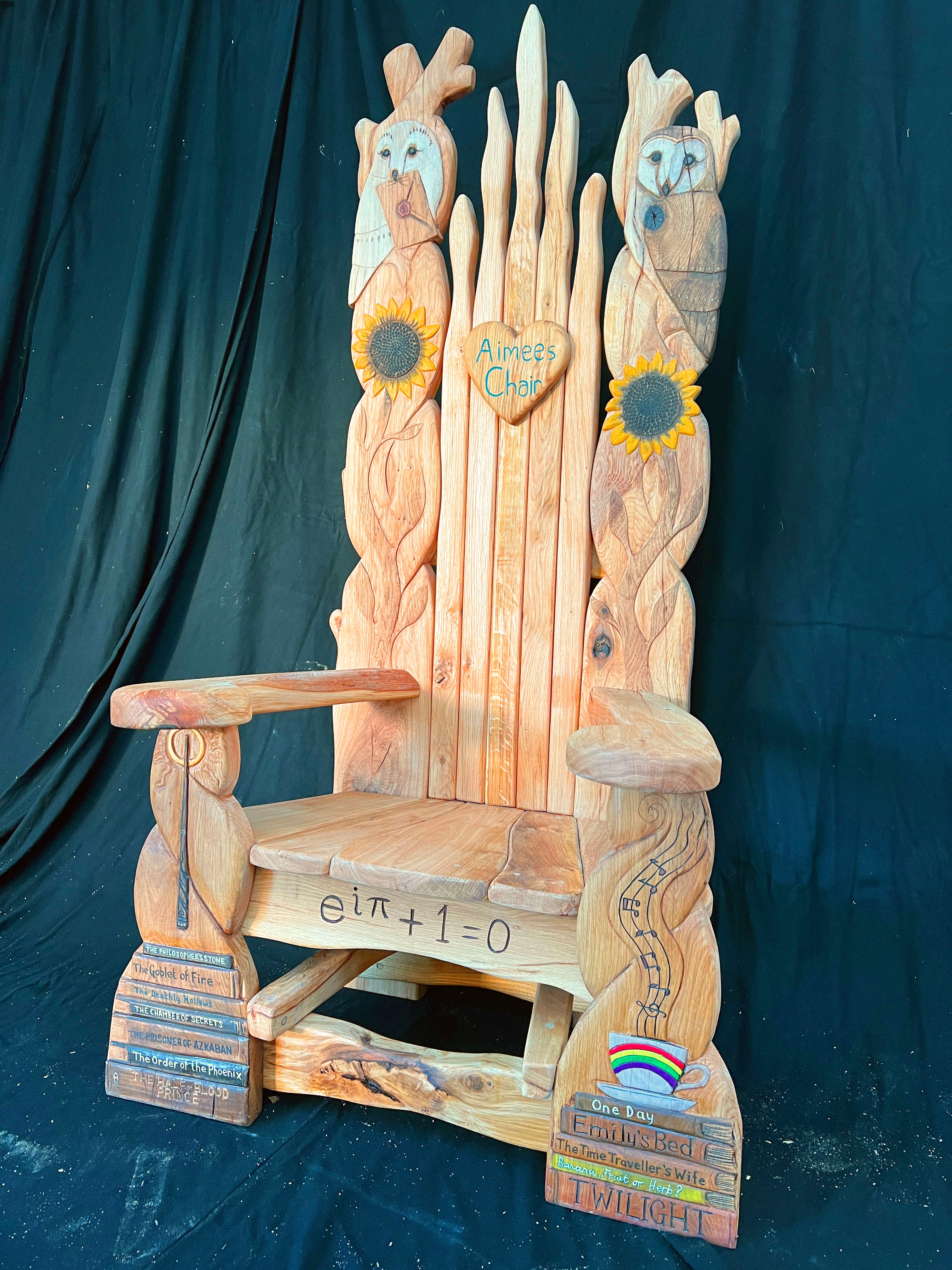 Unique library chair honoring Aimee with carved Harry Potter books, music notes, and sunflowers.