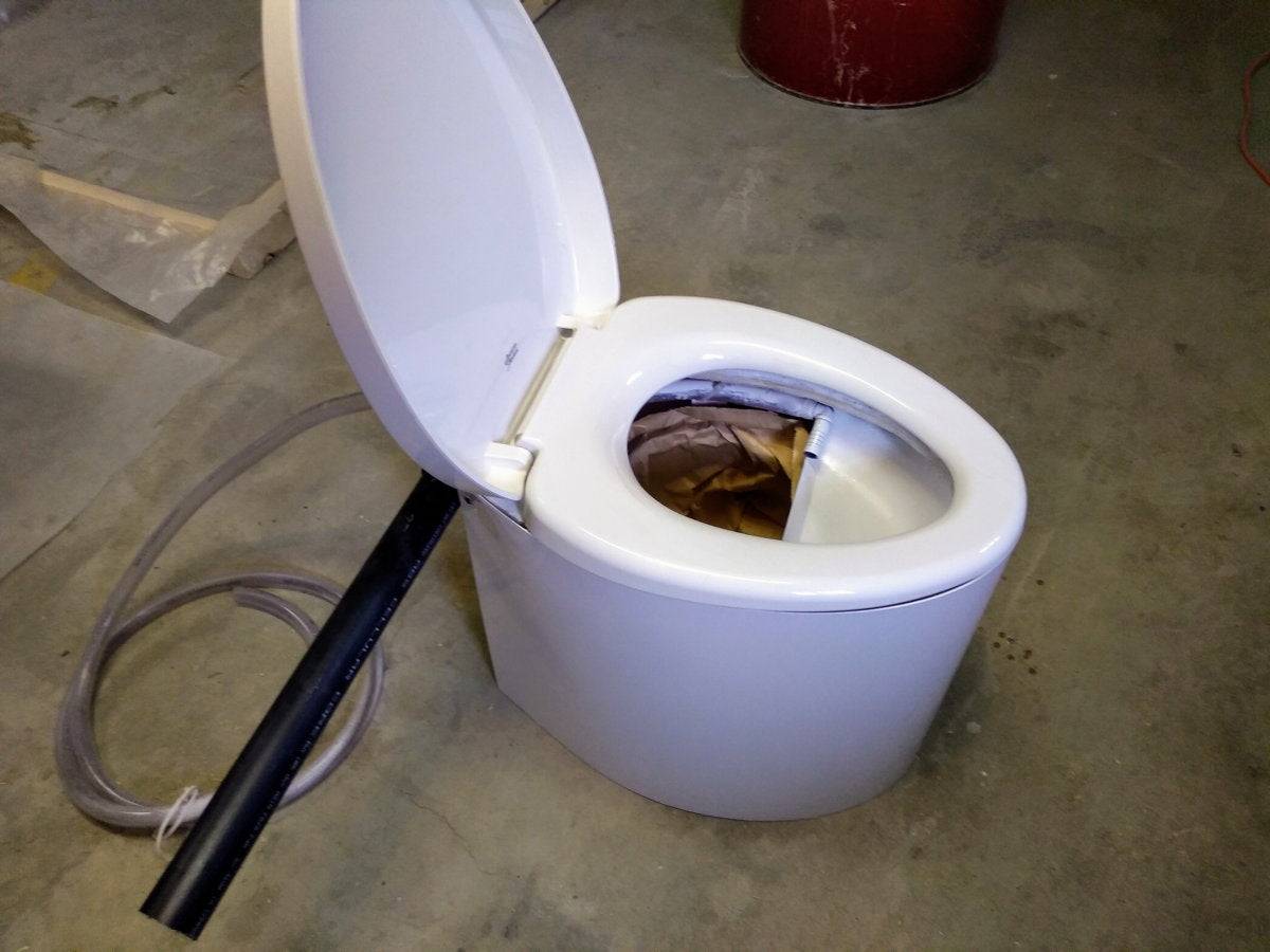 Modern composting toilet with urine diverter