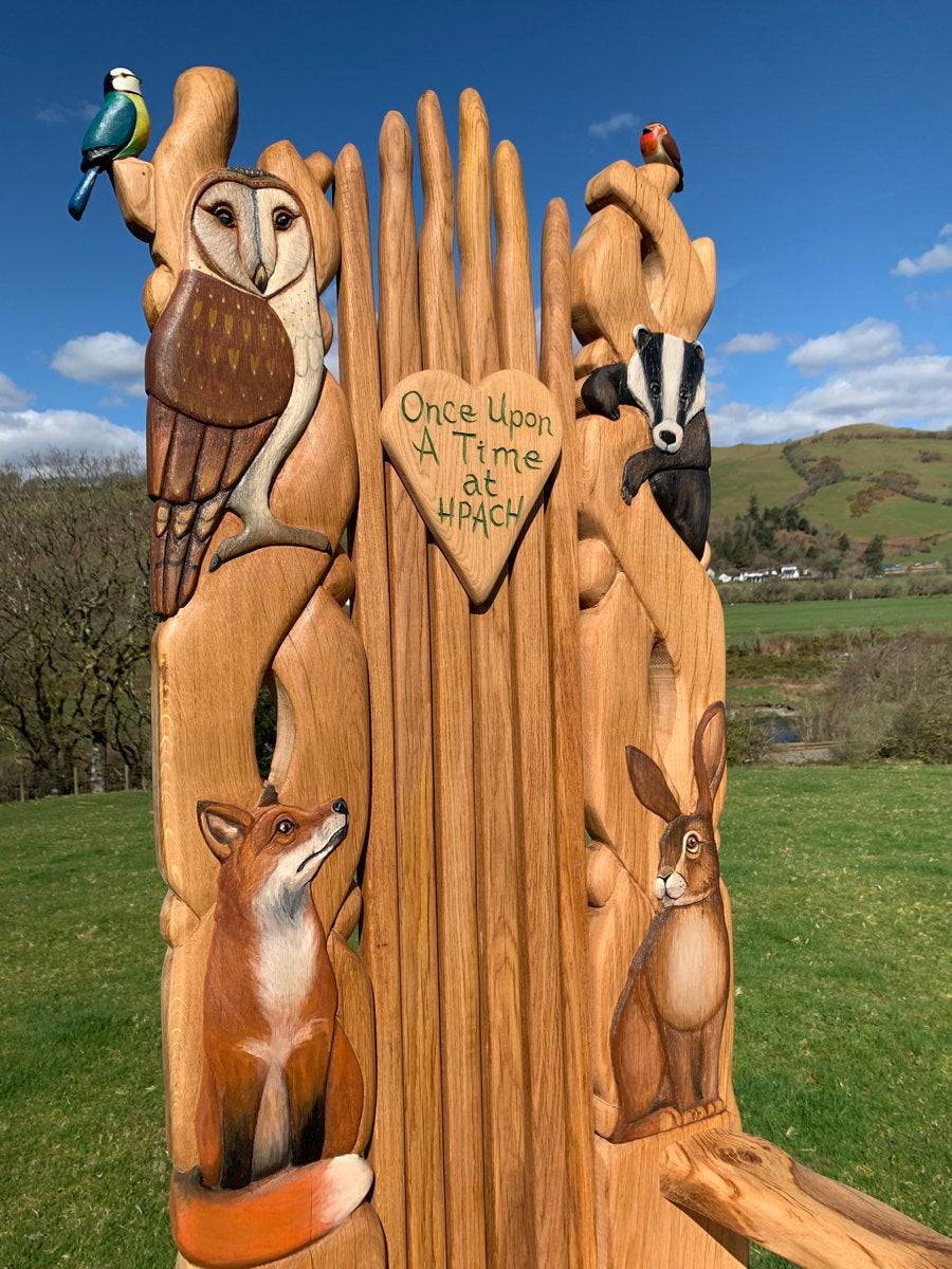 Detailed carvings on garden storytelling chair