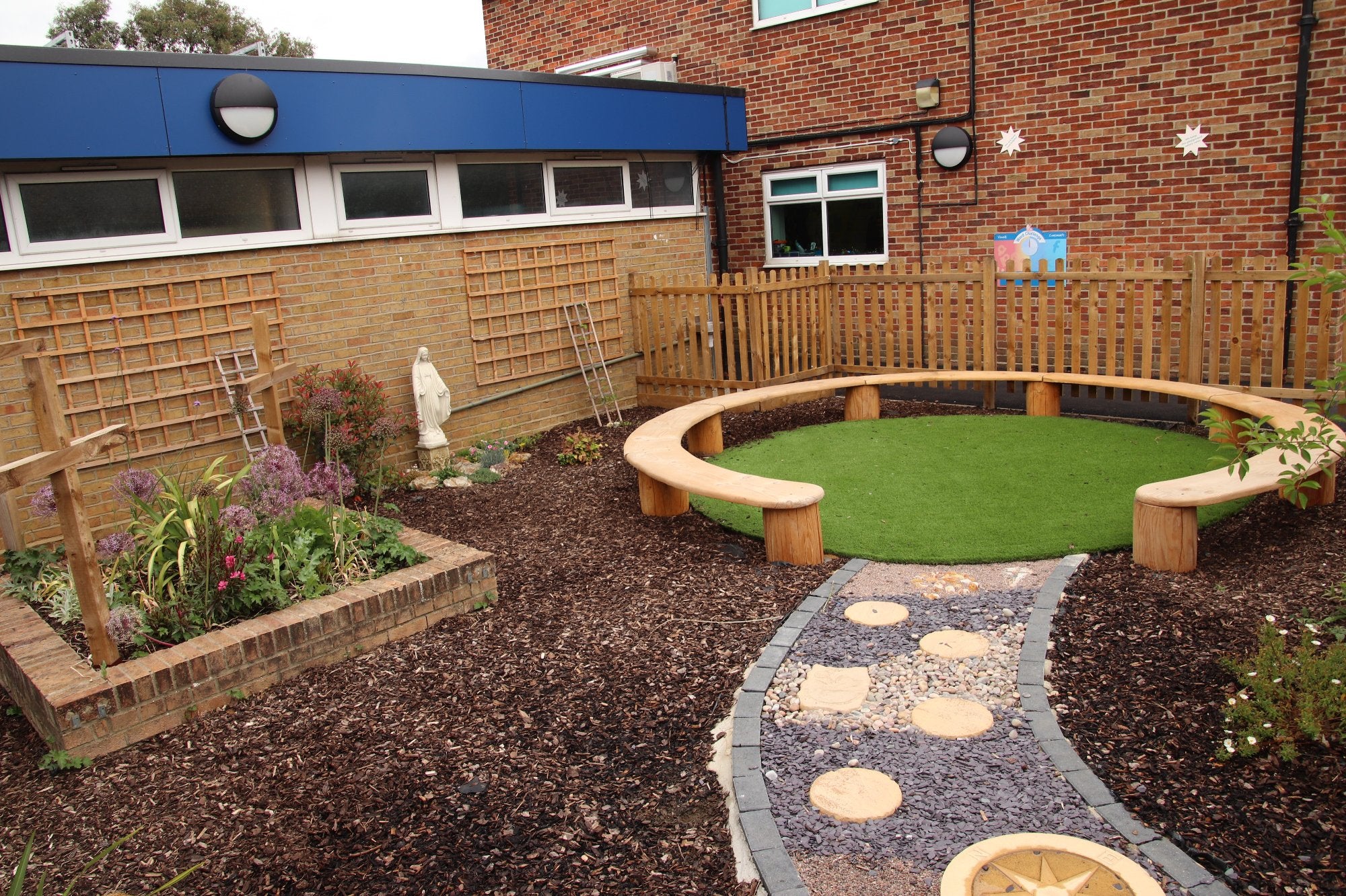 Wooden circular bench in school playground