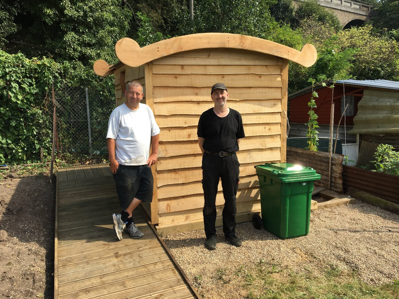 Compost toilet for allotment gardens in Somerset with gardens in the background