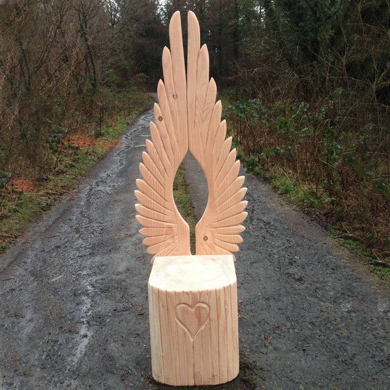 Angel wing fantasy carved oak story chair — bespoke handmade furniture, Wales