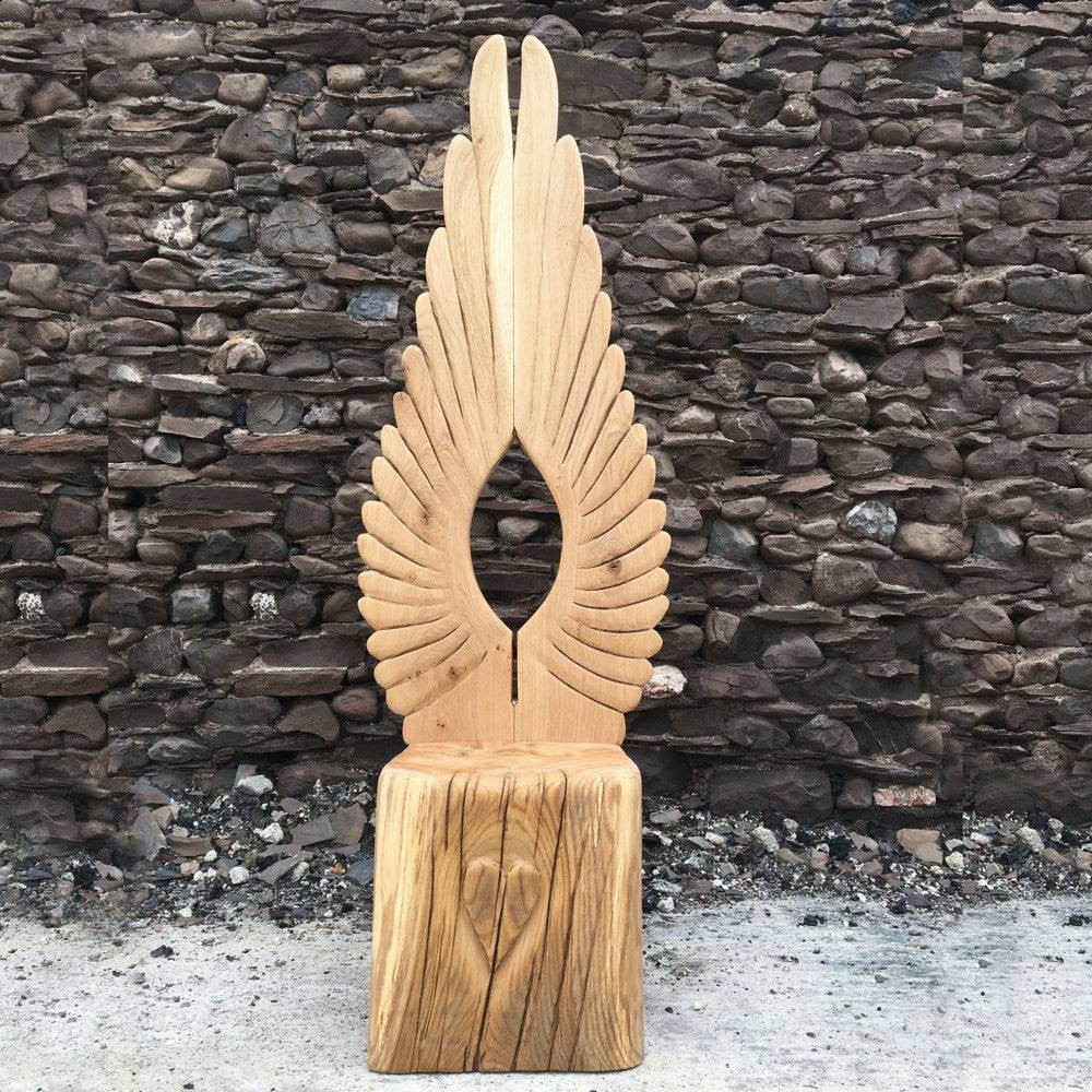 Handcrafted wooden storytelling chair with angel wing backrest, made from locally sourced Douglas Fir or Oak, ideal for schools and libraries.
