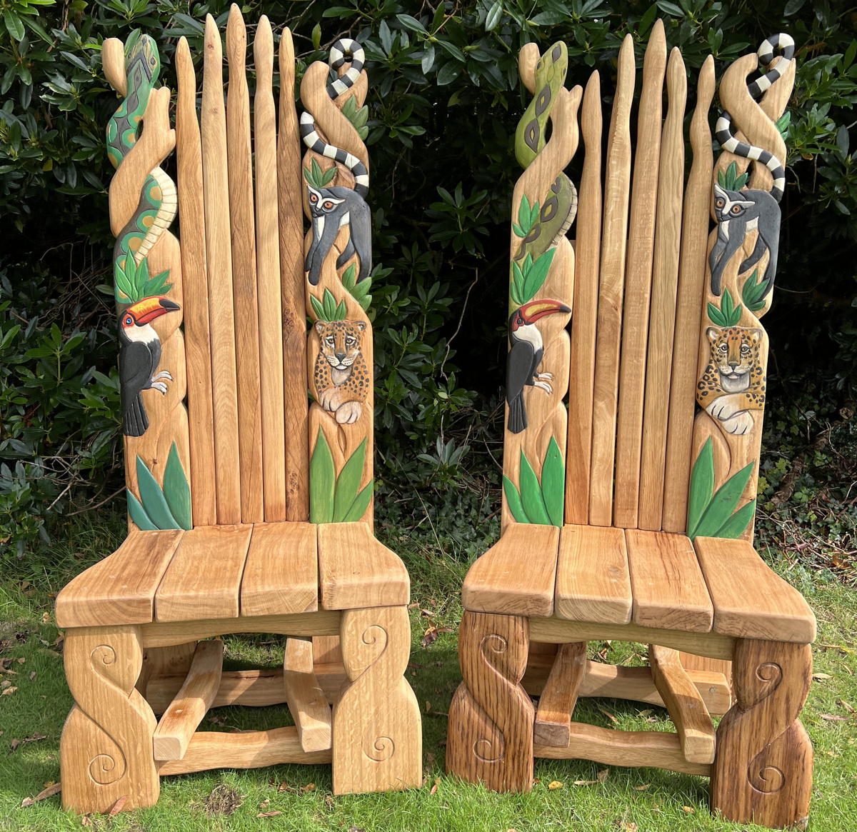 Carved oak chair with jungle animals
