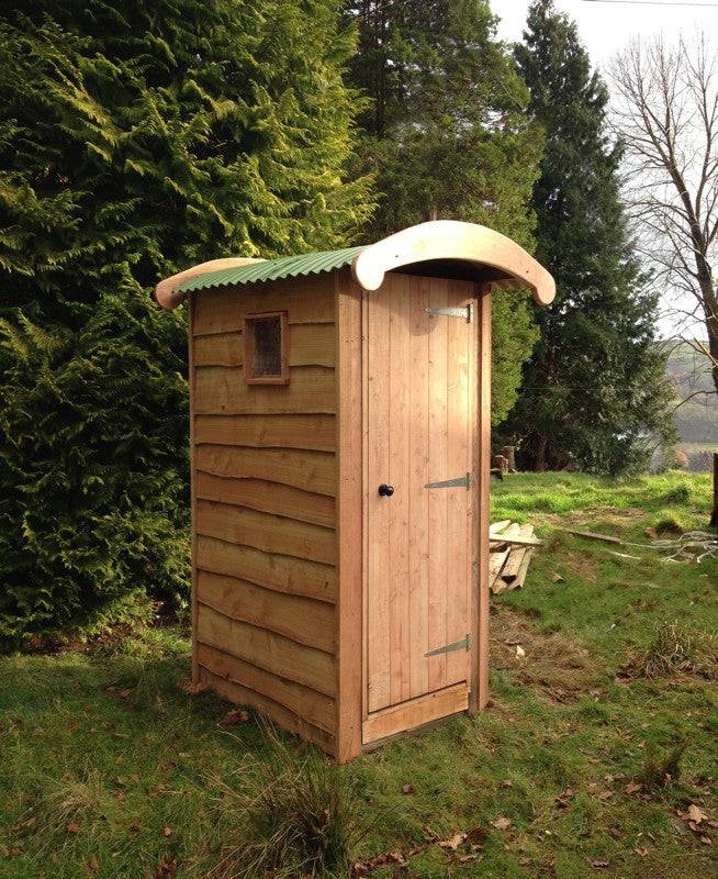 Basic handmade wooden compost loo — simple eco-friendly composting toilet for campsites and woodlands