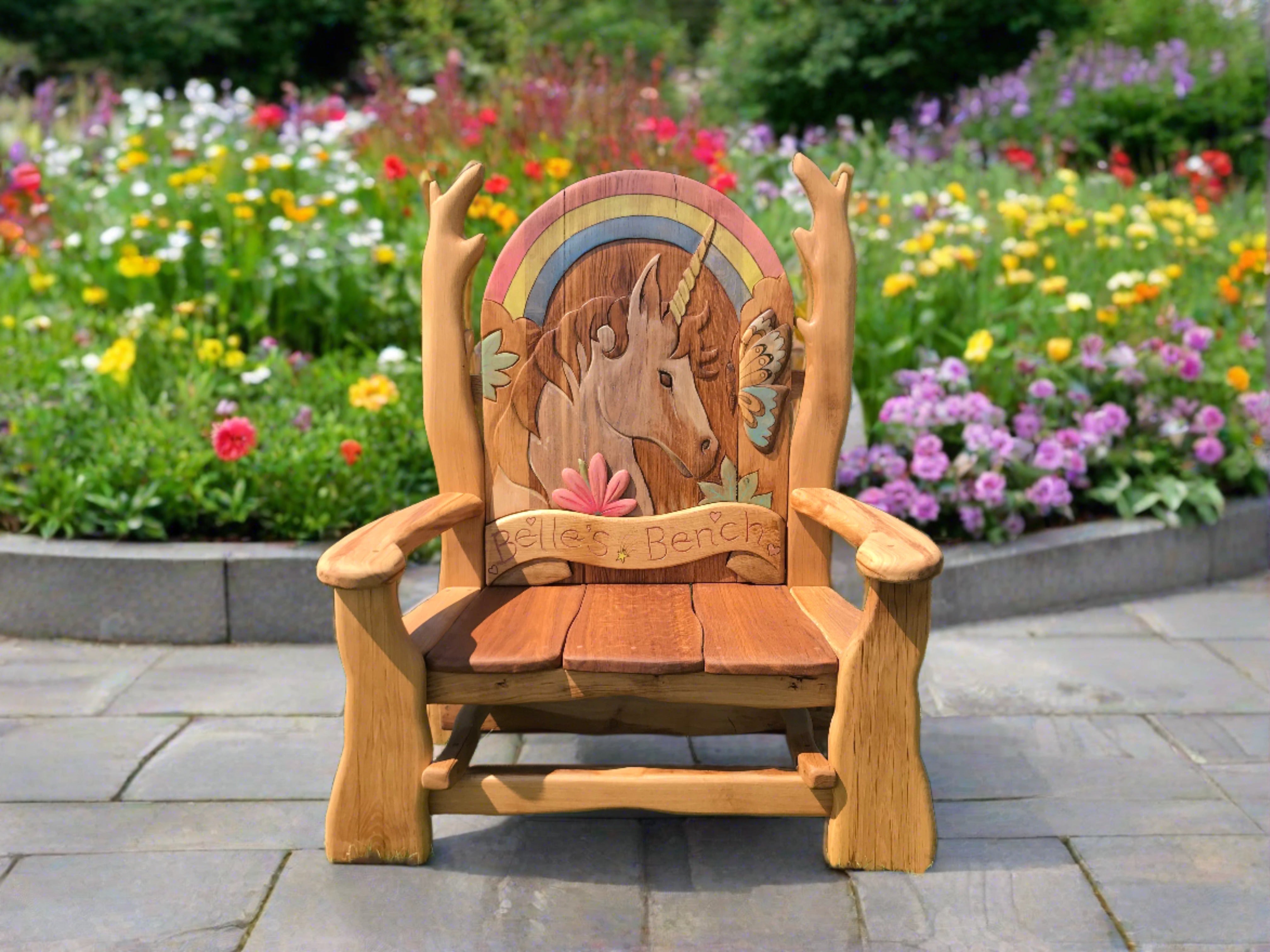 Unicorn-themed wooden bench in vibrant garden