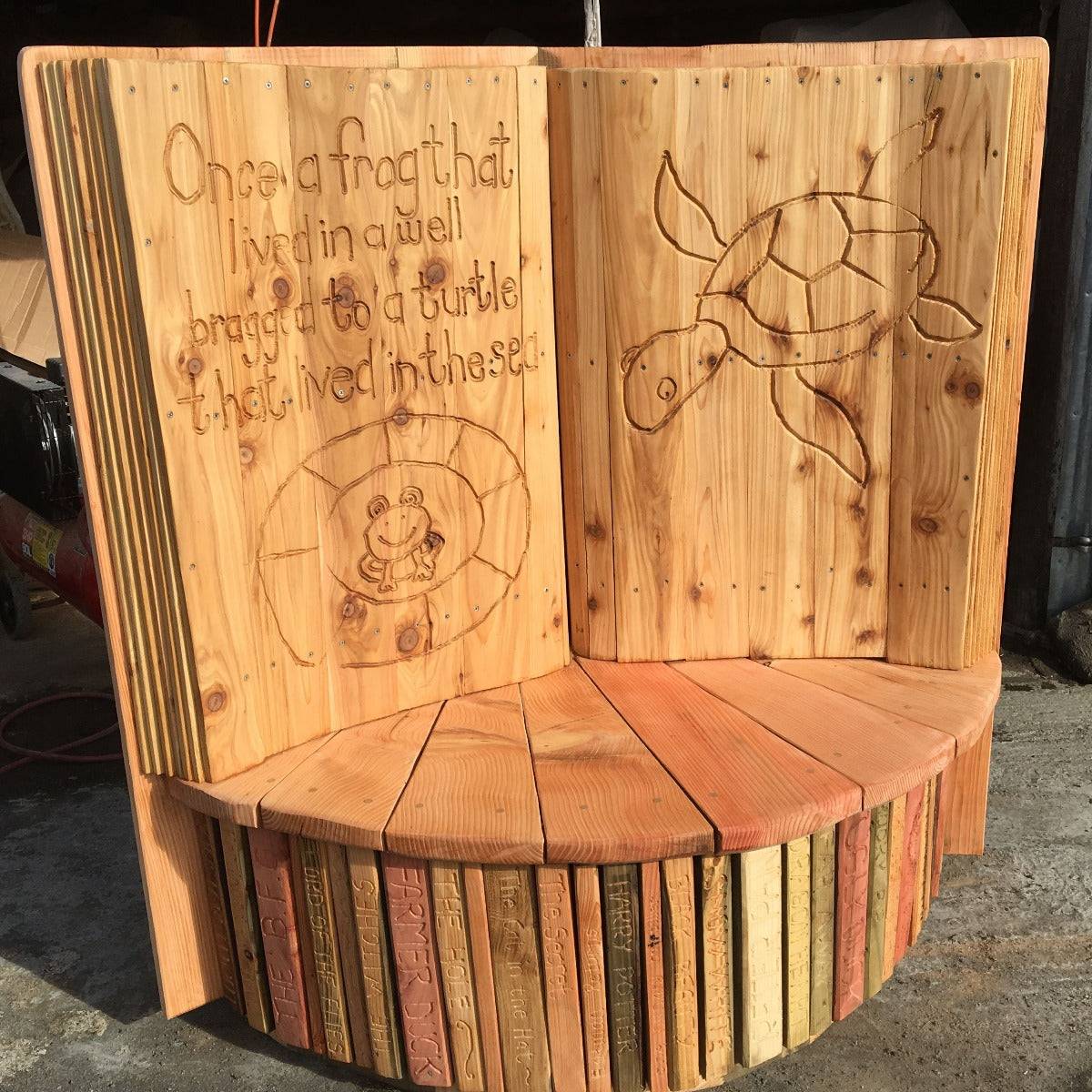 Fantasy carved oak storytelling chair for school — giant book chair, handmade Wales