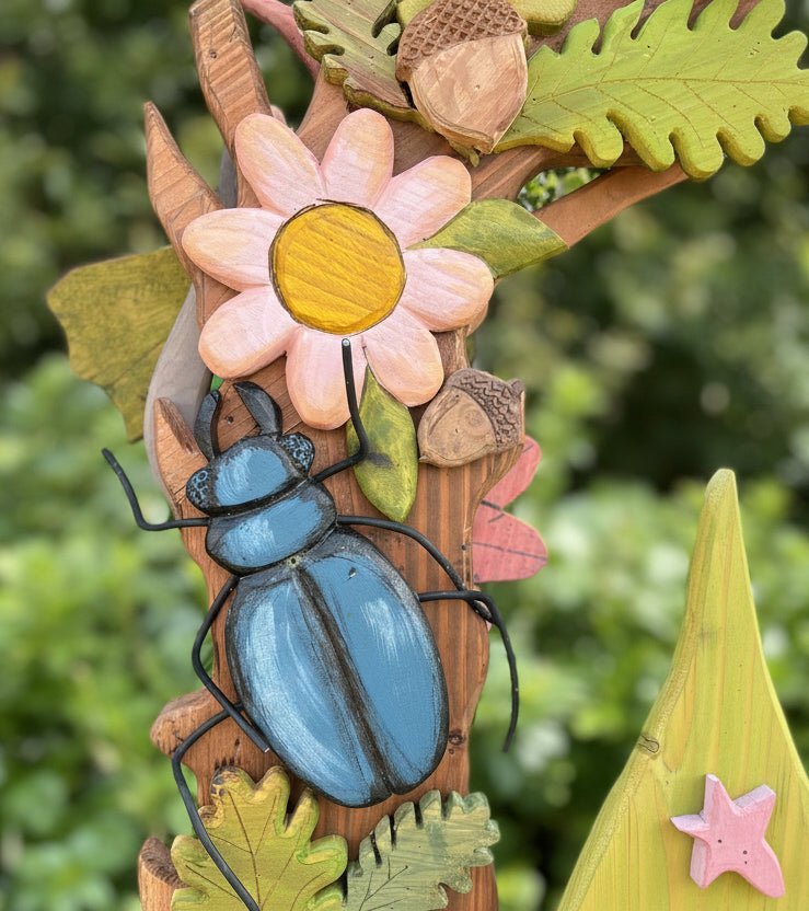 Handmade hand-carved nature trail archway with Bug Trail sign — bespoke, Wales