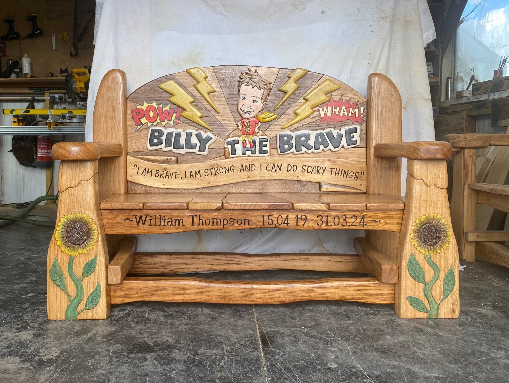 Memorial bench with cartoon design in workshop