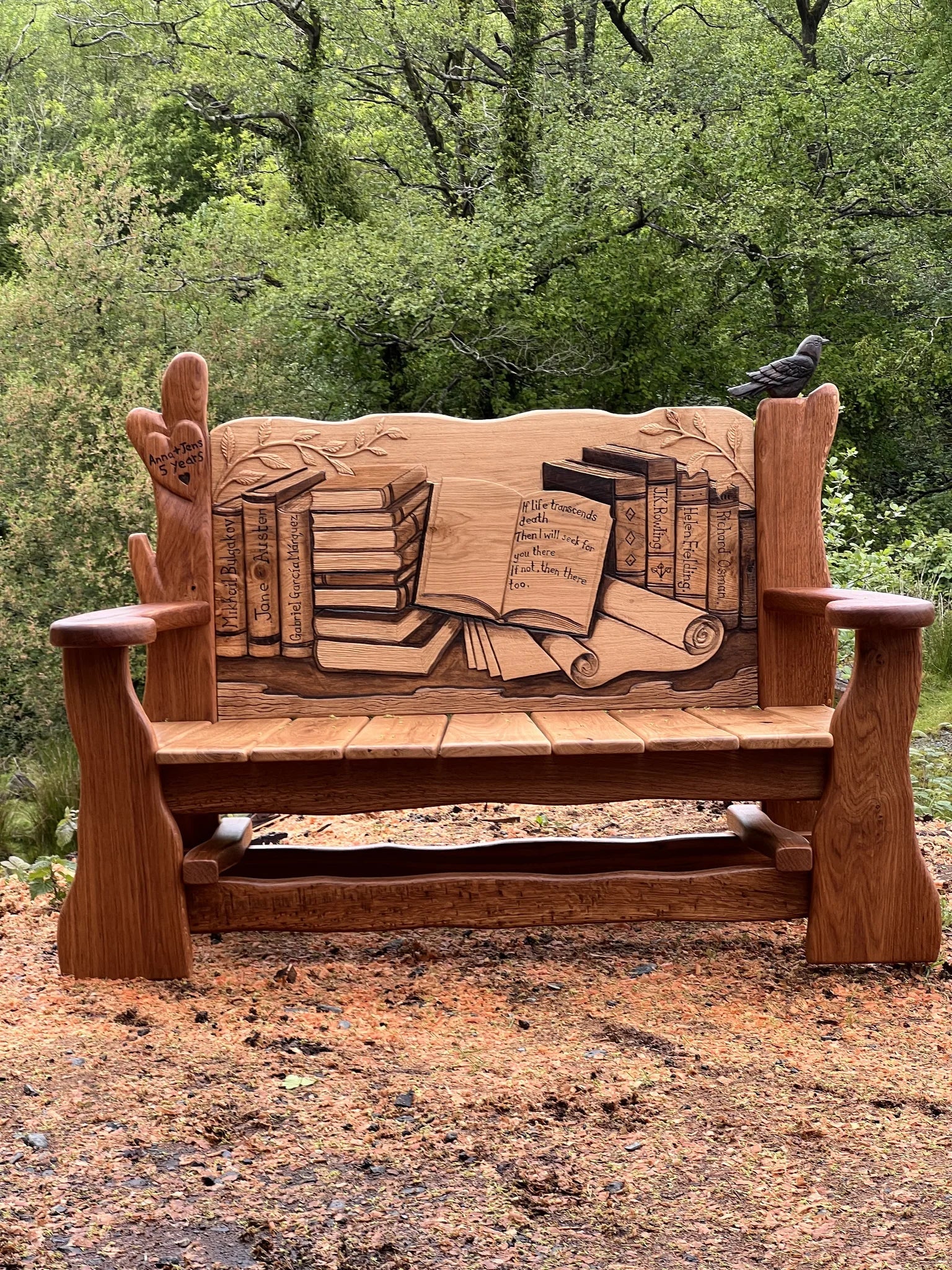 Close-up of the carved open book reading Once upon a time with a scroll on the oak bench