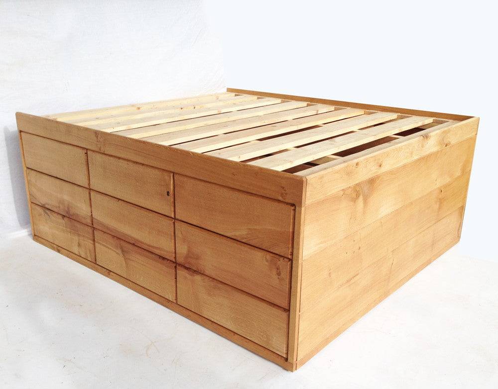 Solid oak storage bed with multiple drawers — handcrafted bespoke bedroom furniture, Wales