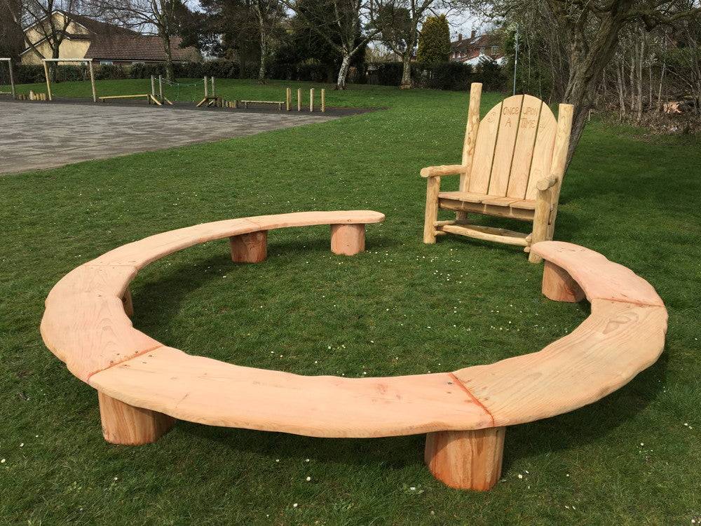 Circular wooden bench — handmade carved oak ring seating for school playgrounds, Wales