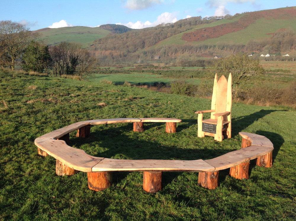 Handmade circular bench for schools — carved oak ring seating for outdoor spaces, Wales