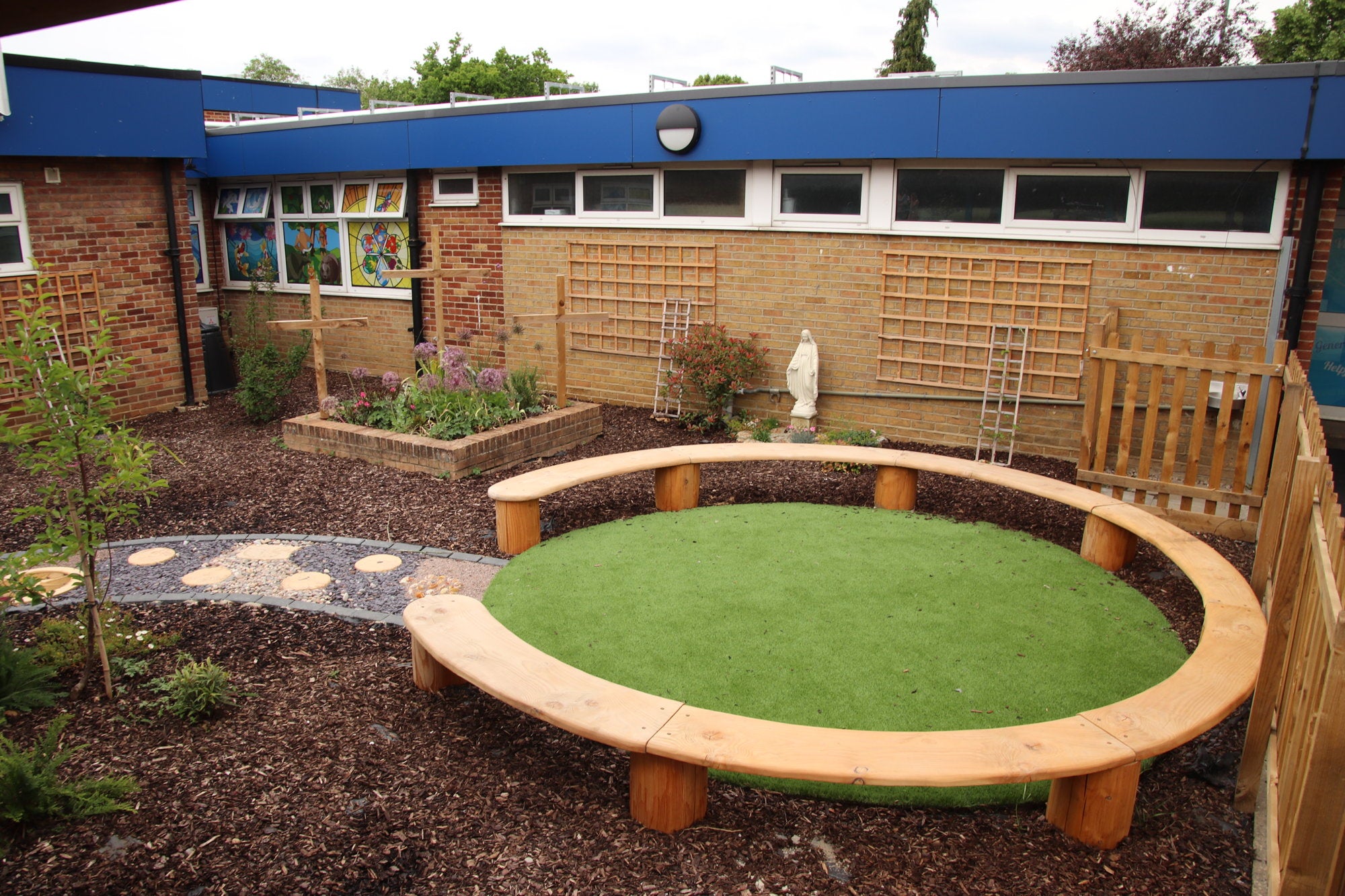 Circular Wooden Bench in school playground 