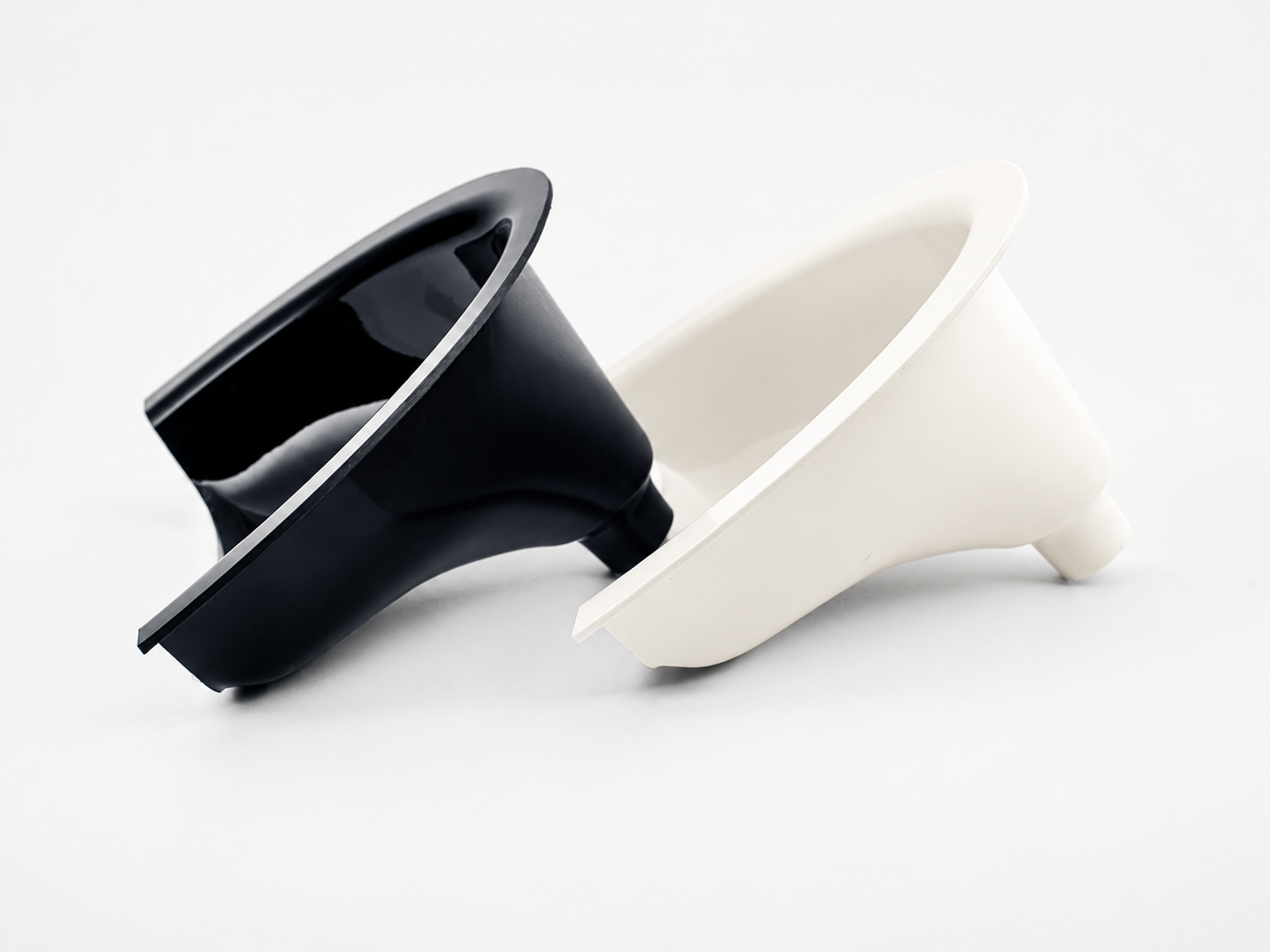Compact urine separator diverter pair – black and white – off-grid toilet