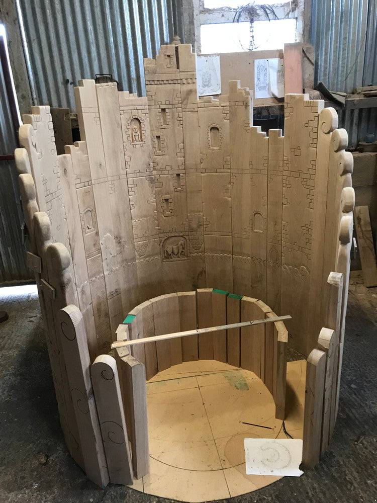 Harlech castle-inspired carved oak throne chair — bespoke handmade fantasy furniture, Wales