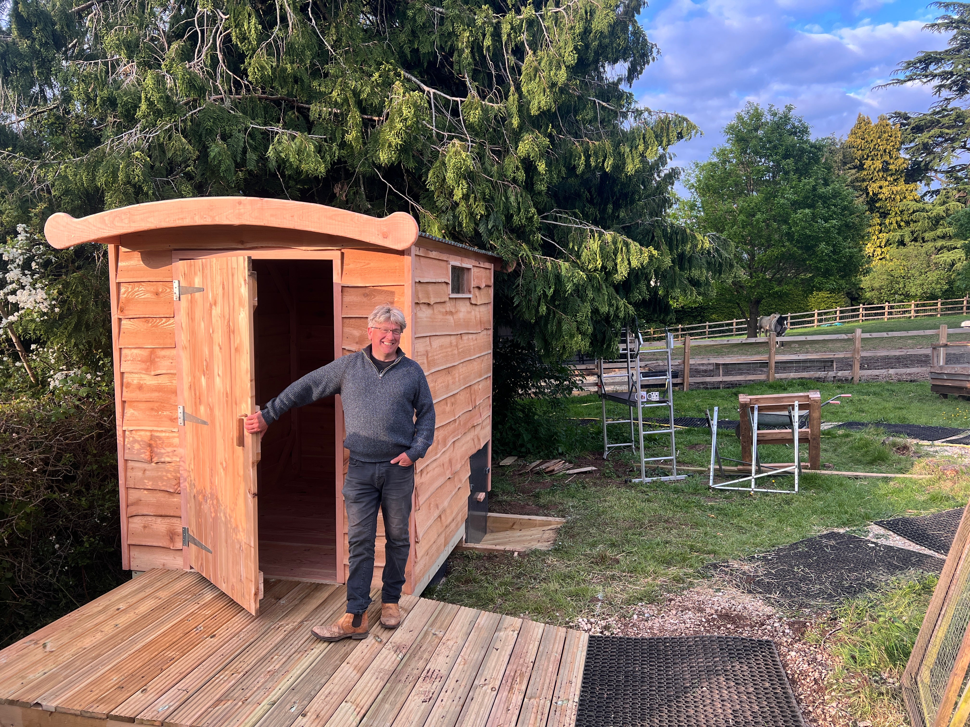 "Disabled access compost toilet with wheelchair ramp, installed at an animal sanctuary in Wales — handmade from cedar by Free Range Designs"