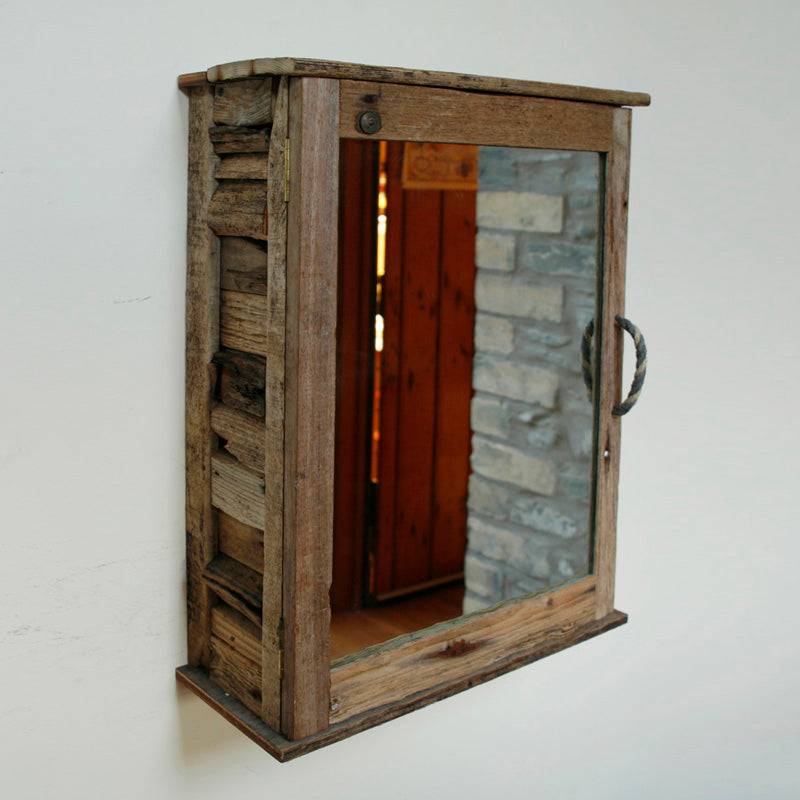 Handcrafted driftwood bathroom cabinet with natural coastal wood — bespoke bathroom furniture, Wales