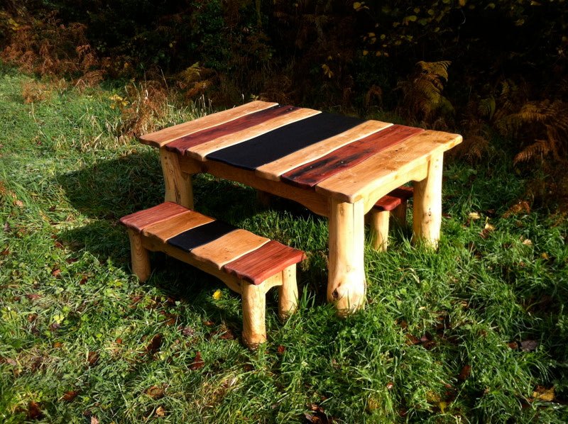 Side view of handmade driftwood dining table — oak, slate and Jarrah, Wales
