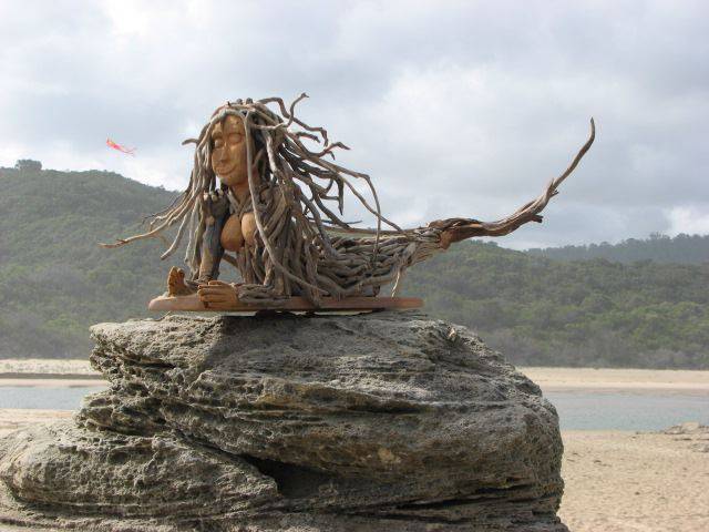 Handcrafted driftwood mermaid wall sculpture front view — unique coastal art, Wales